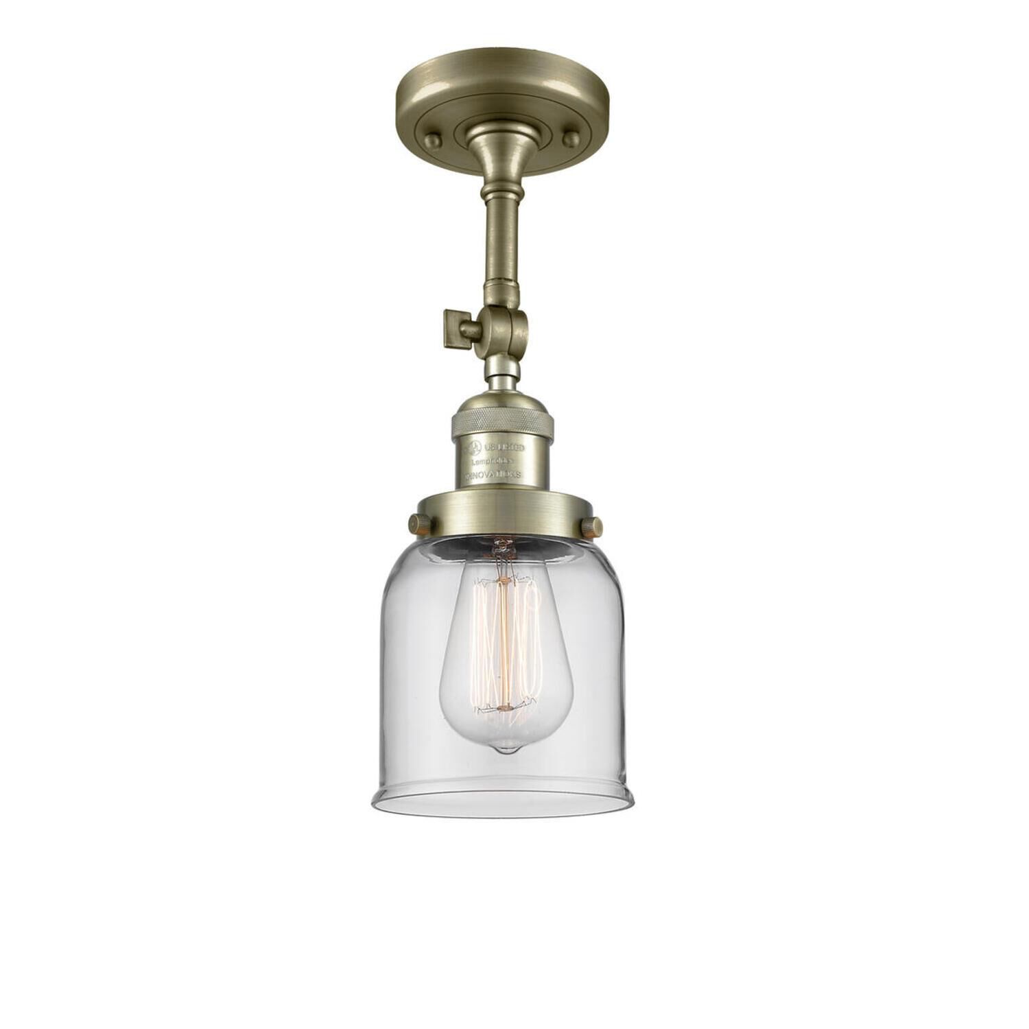 Shown in Antique Brass finish and Clear glass and None accent