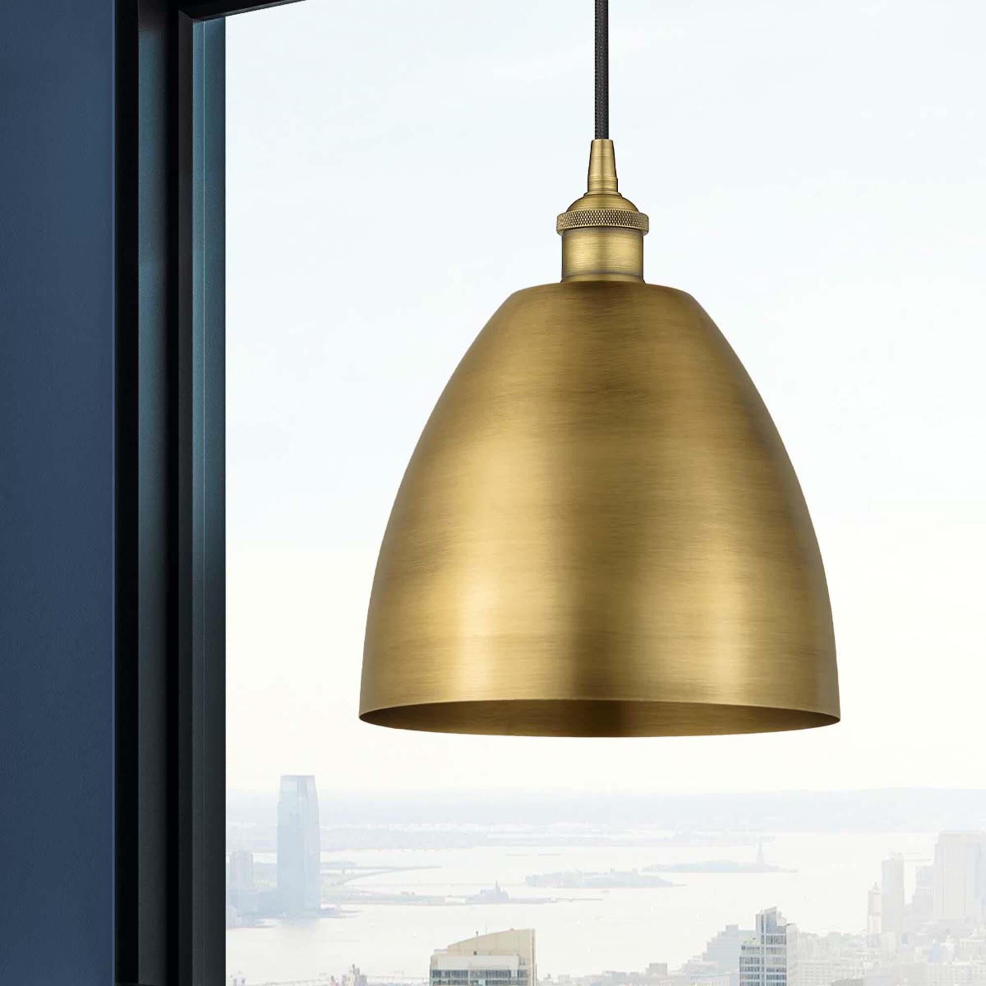 Shown in Brushed Brass finish and Matte Black Edison Dome shade