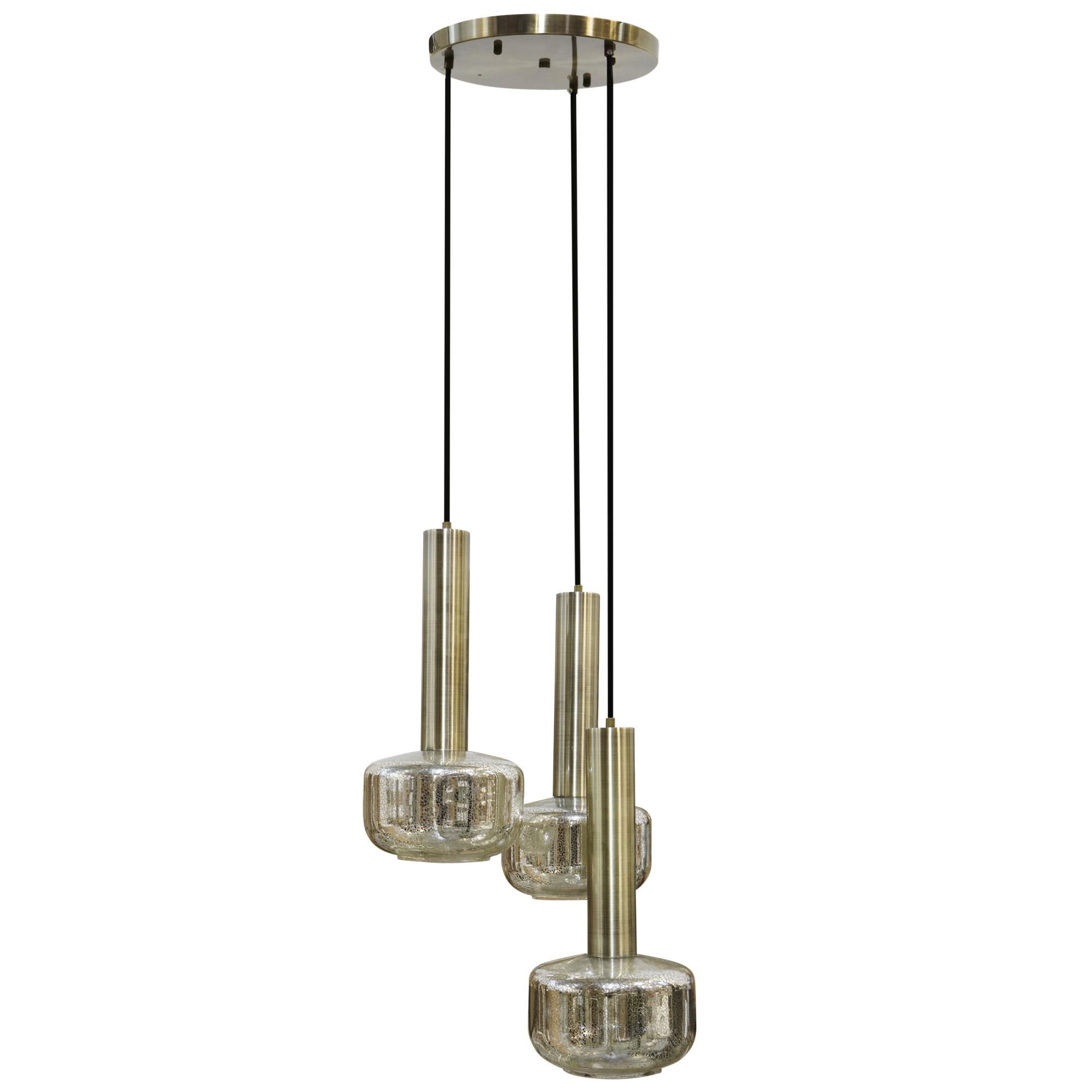 Shown in Antique Brass And Silver Mercury finish and Silver Mercury shade