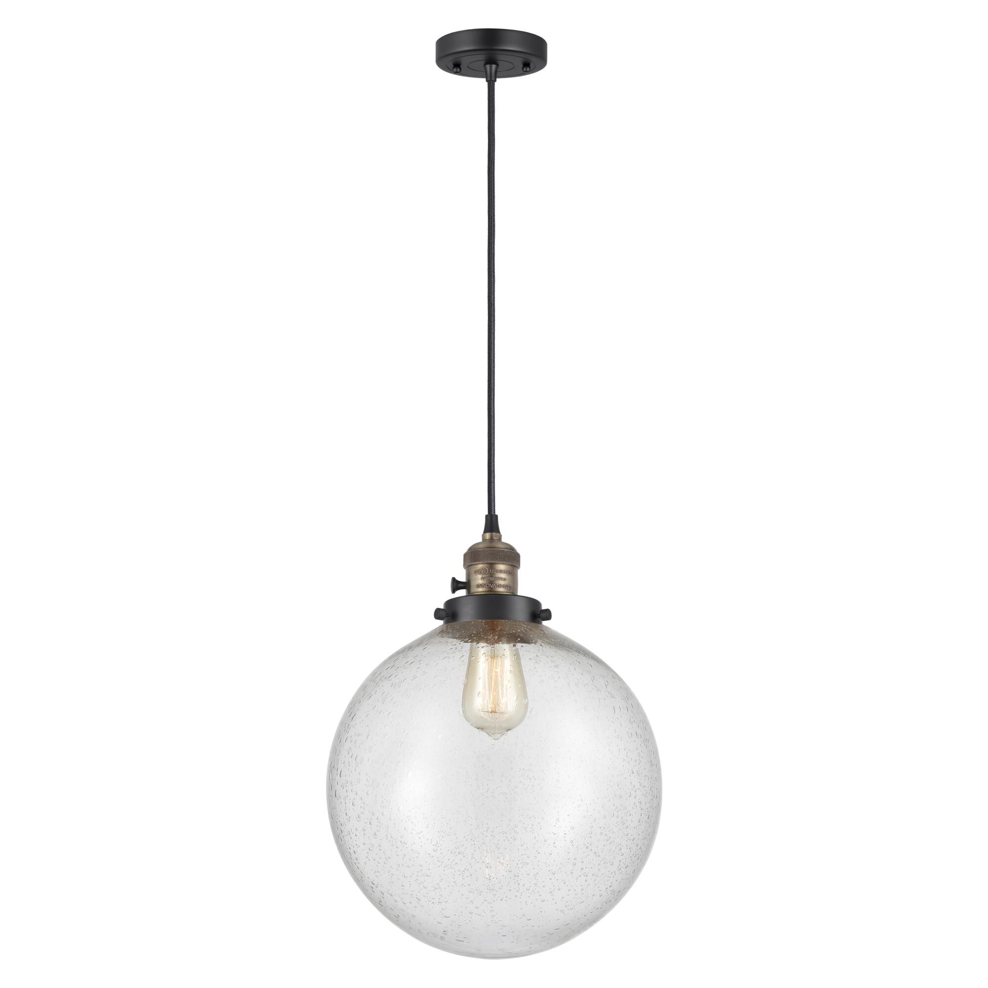 Shown in Black Antique Brass finish and Seedy glass