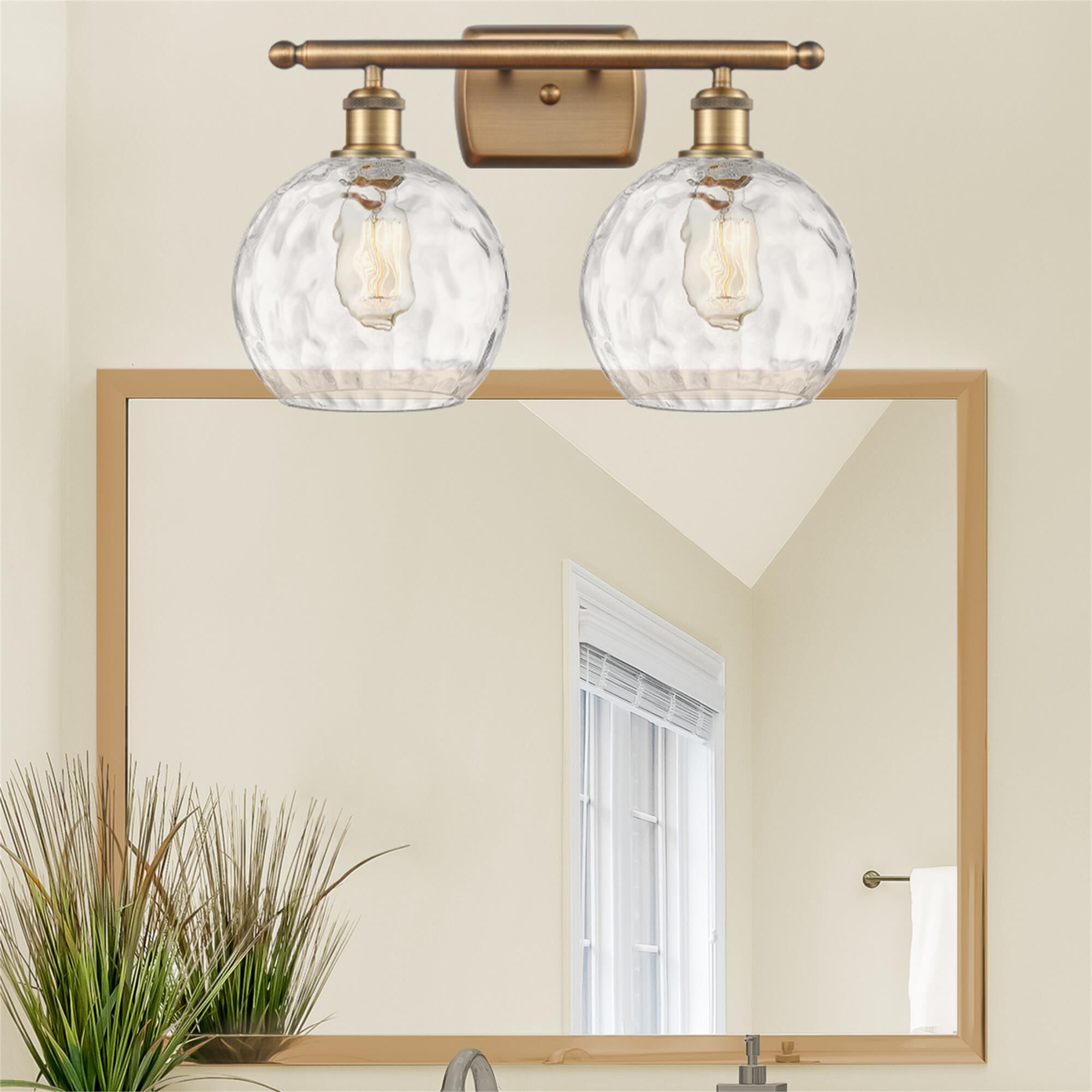 Shown in Brushed Brass finish and Clear glass