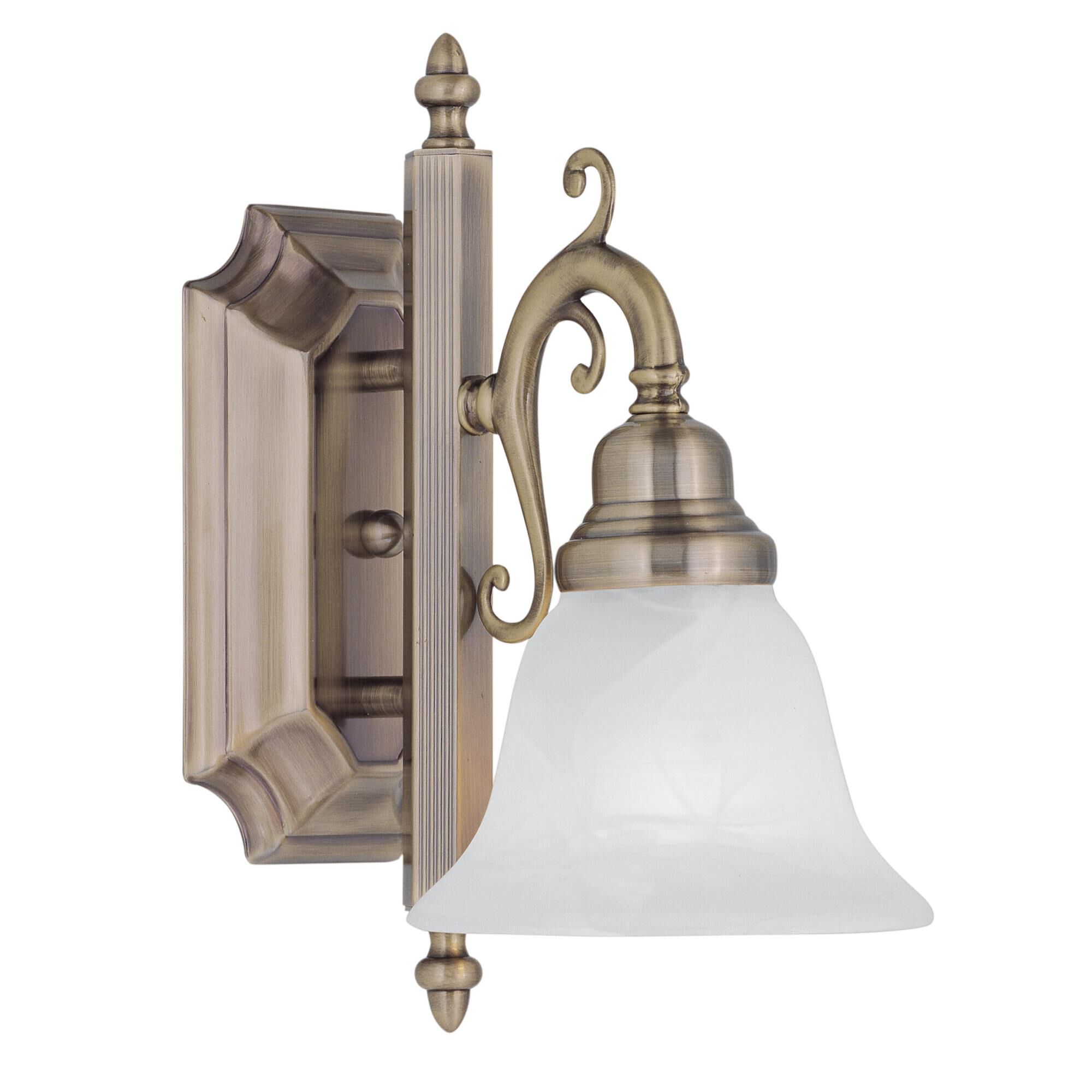 Shown in Antique Brass finish and White Alabaster glass