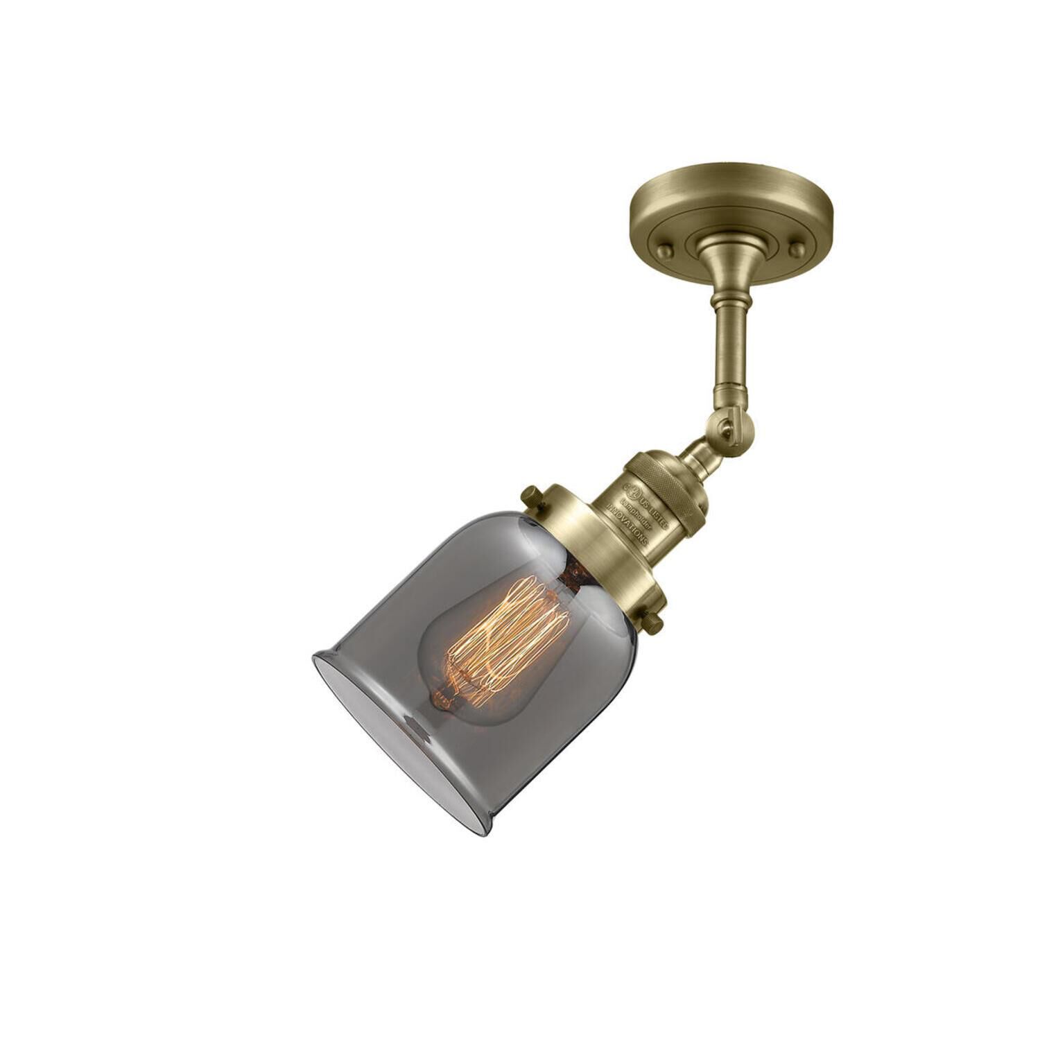 Shown in Antique Brass finish and Plated Smoked glass and None accent