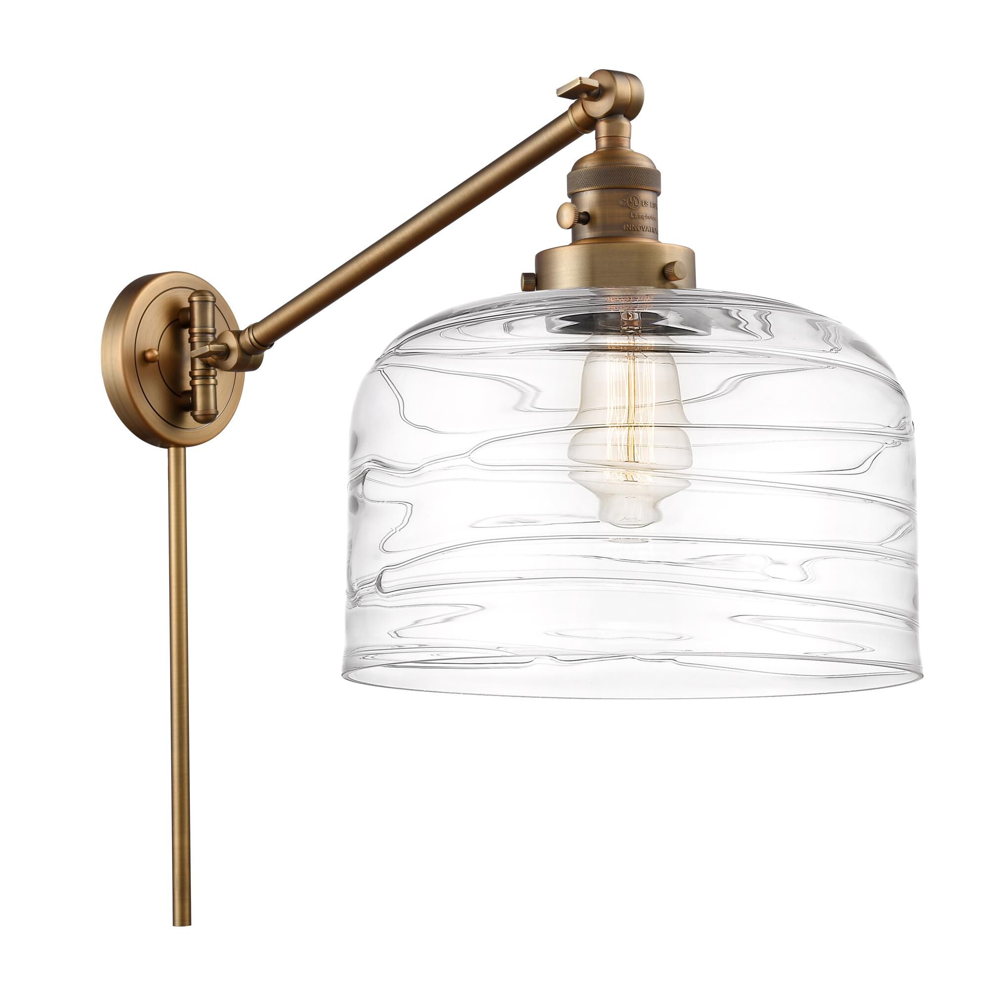 Shown in Brushed Brass finish and Clear Deco Swirl X-Large Bell glass