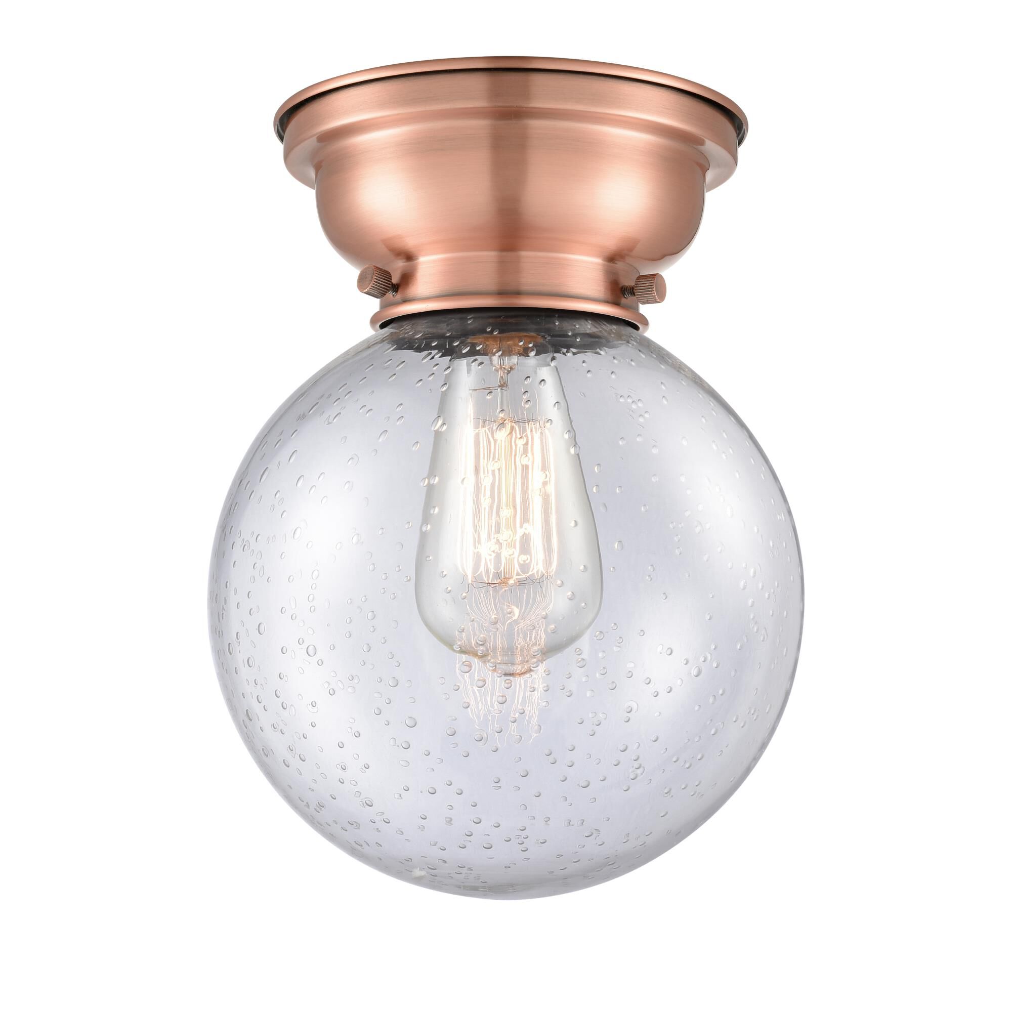 Shown in Antique Copper finish and Globe glass and Glass shade