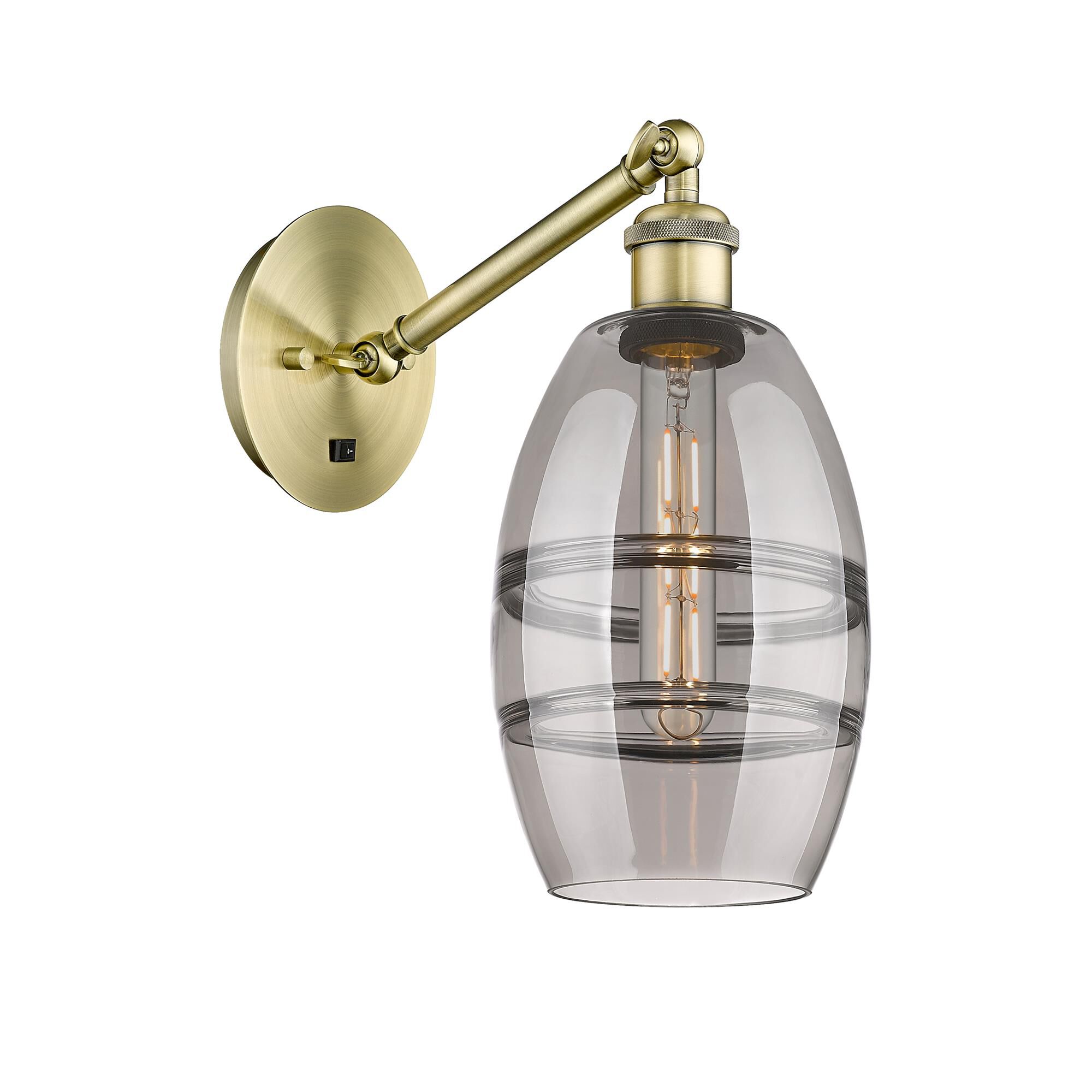 Shown in Antique Brass finish and Light Smoke glass