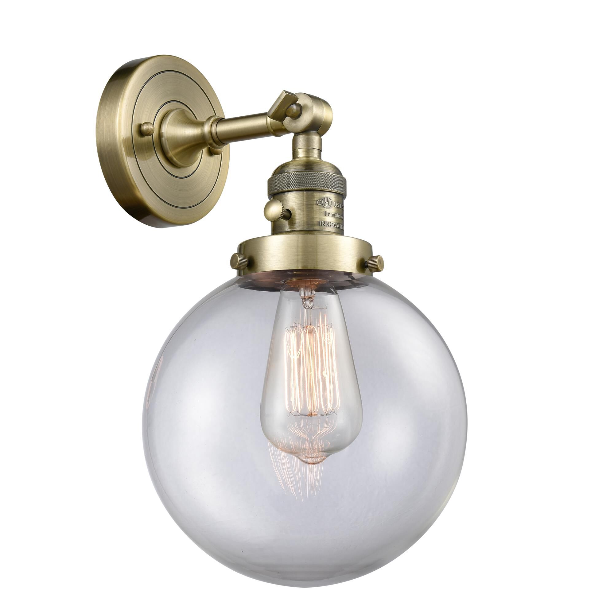 Shown in Antique Brass finish and Clear glass and Switch on Socket accent