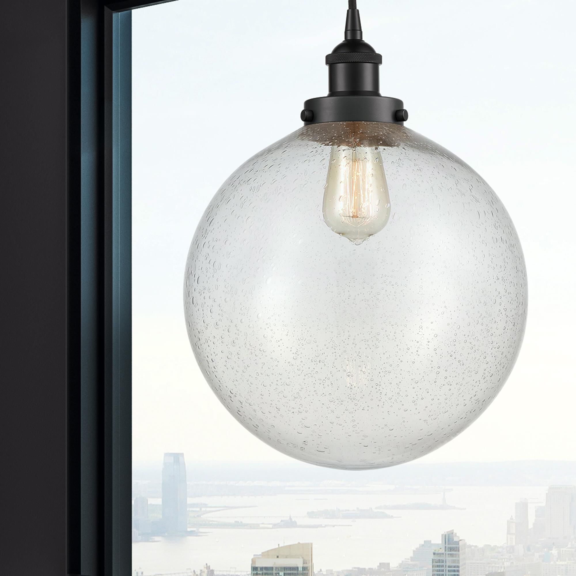 Shown in Matte Black finish and Seedy Beacon glass