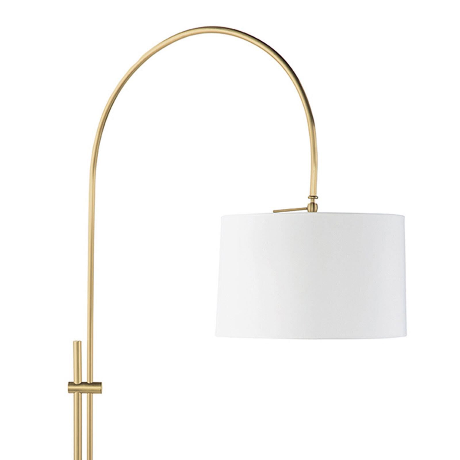 Shown in Natural Brass finish and Linen shade