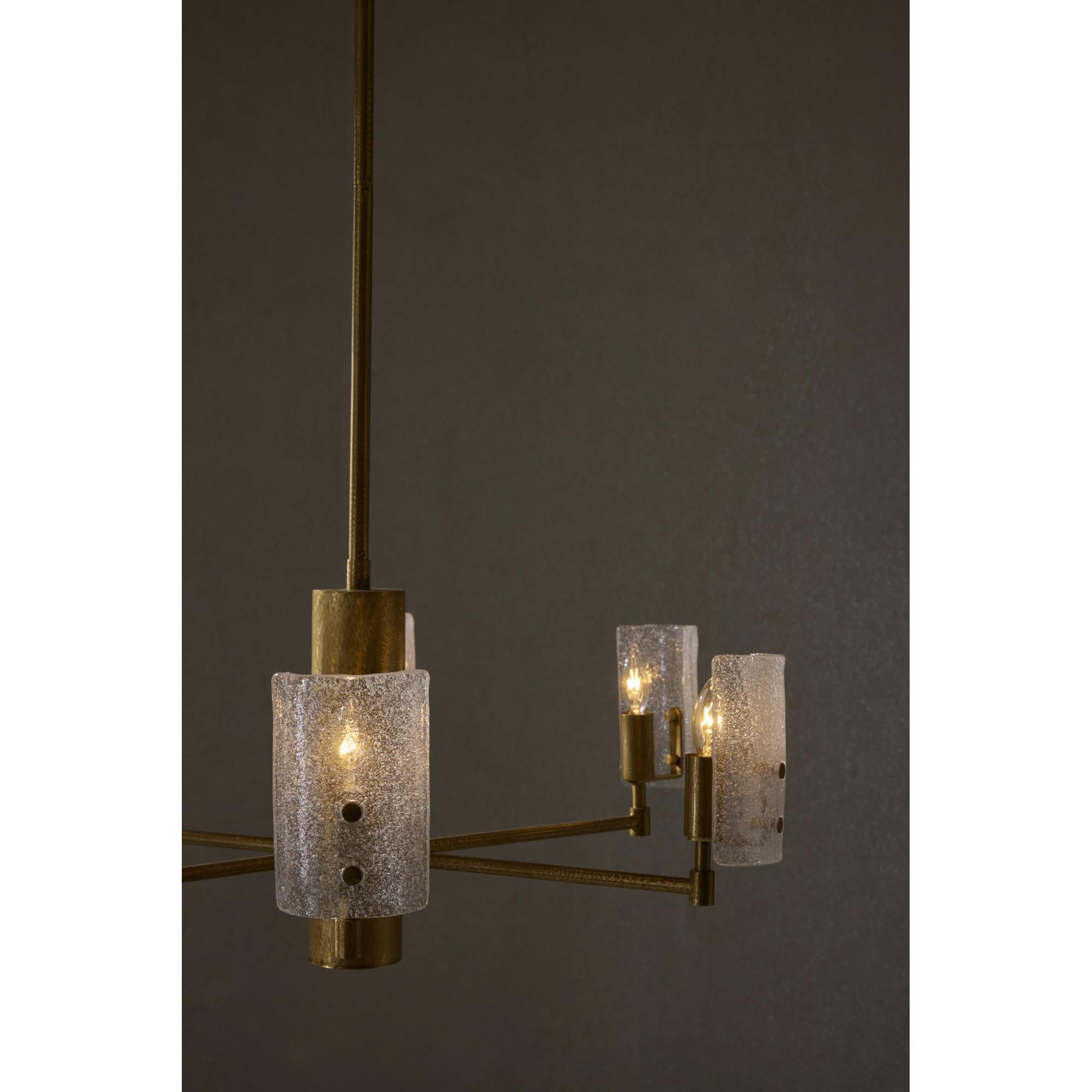 Shown in Antique Brass finish and Clear Seedy Slump glass