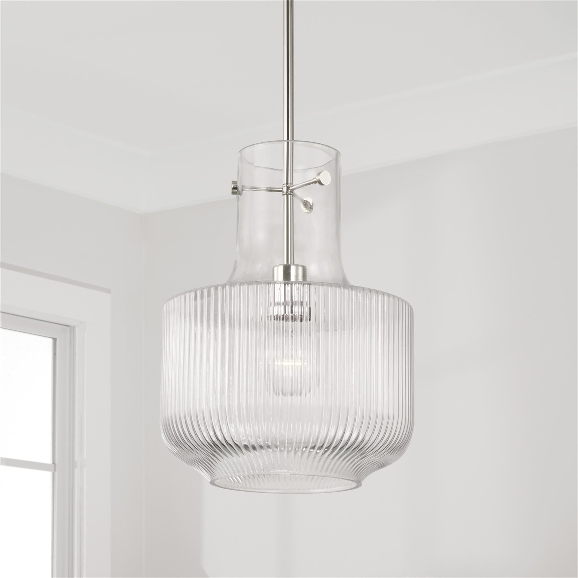 Shown in Polished Nickel finish and Clear Fluted glass