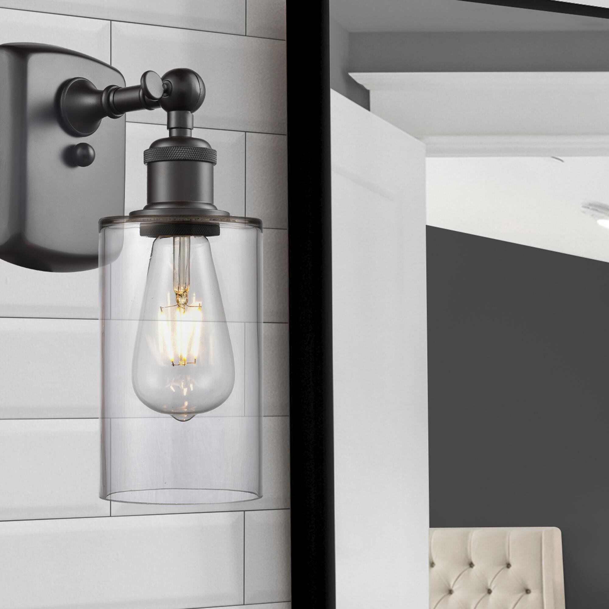 Shown in Oil Rubbed Bronze finish and Drum glass and Glass shade and Polished Chrome accent