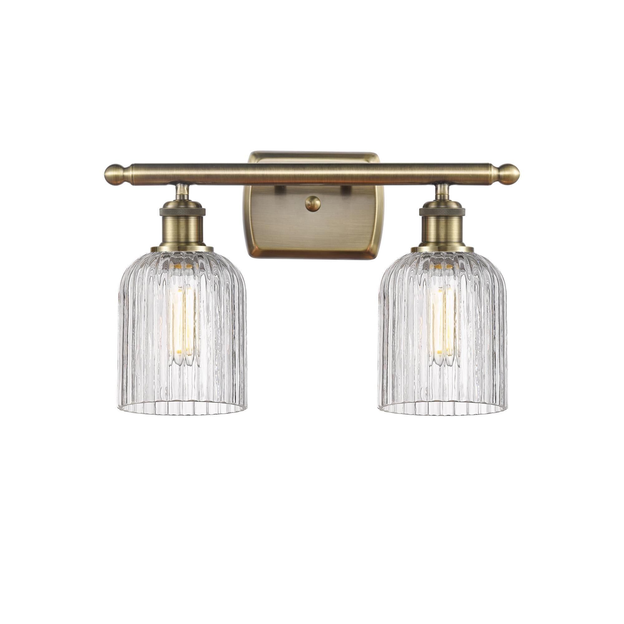 Shown in Antique Brass finish and Clear glass