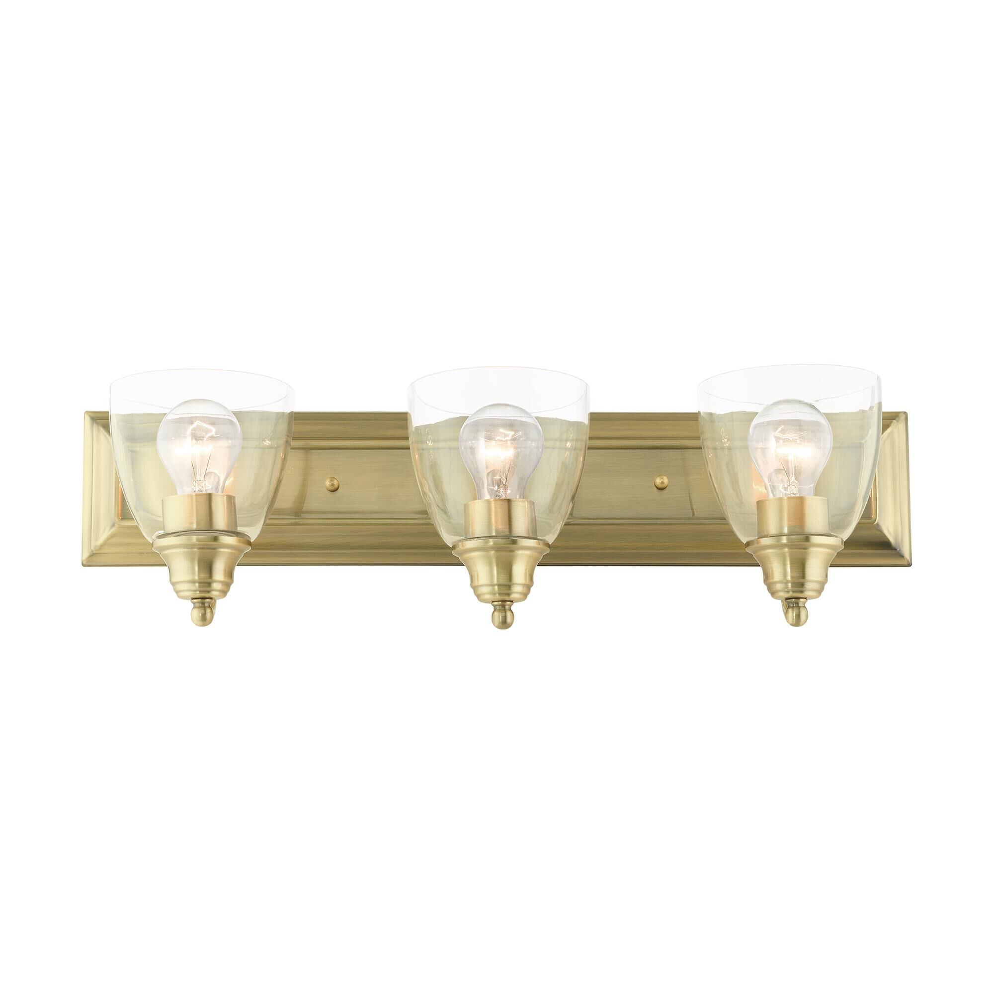 Shown in Antique Brass finish and Hand Blown Clear glass