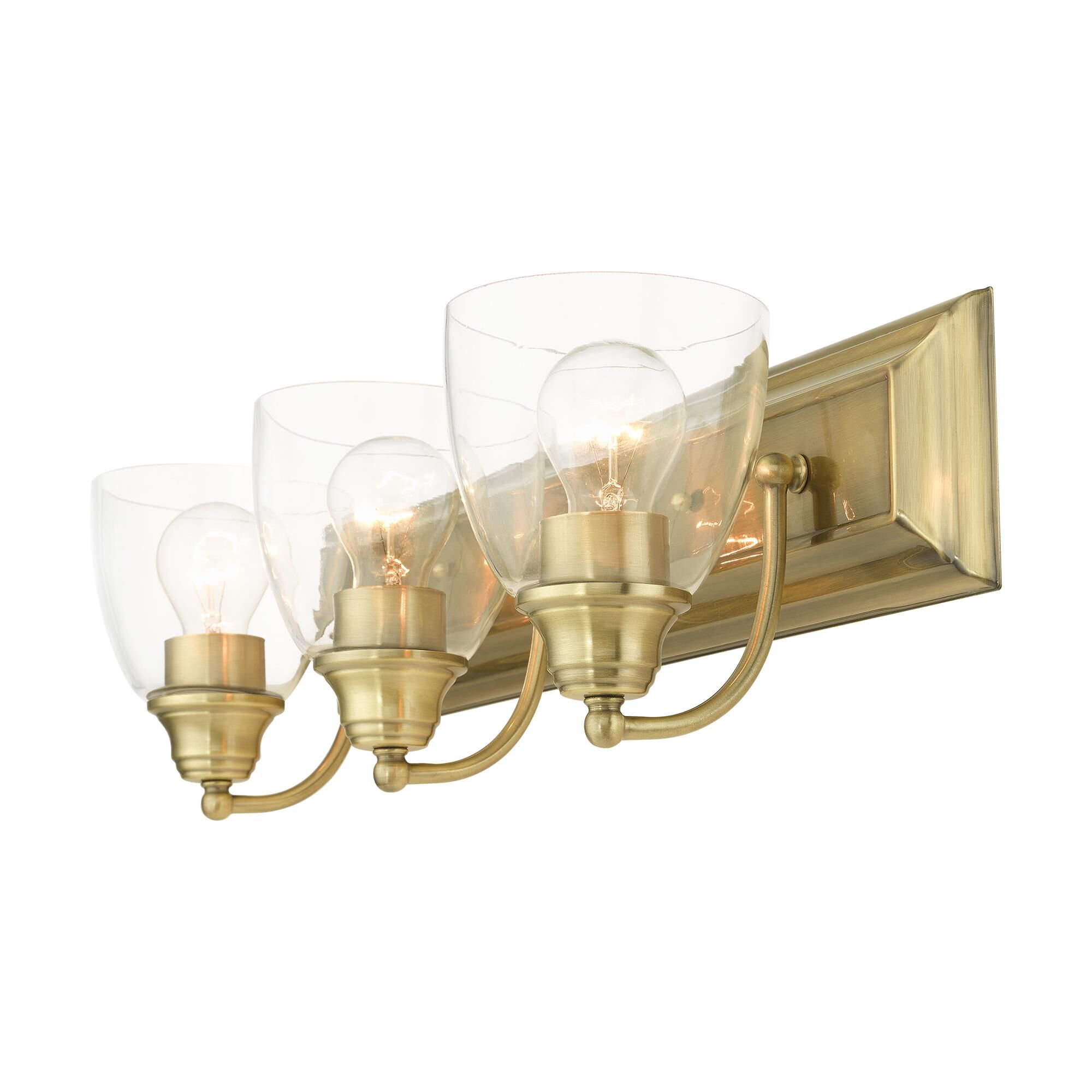 Shown in Antique Brass finish and Hand Blown Clear glass