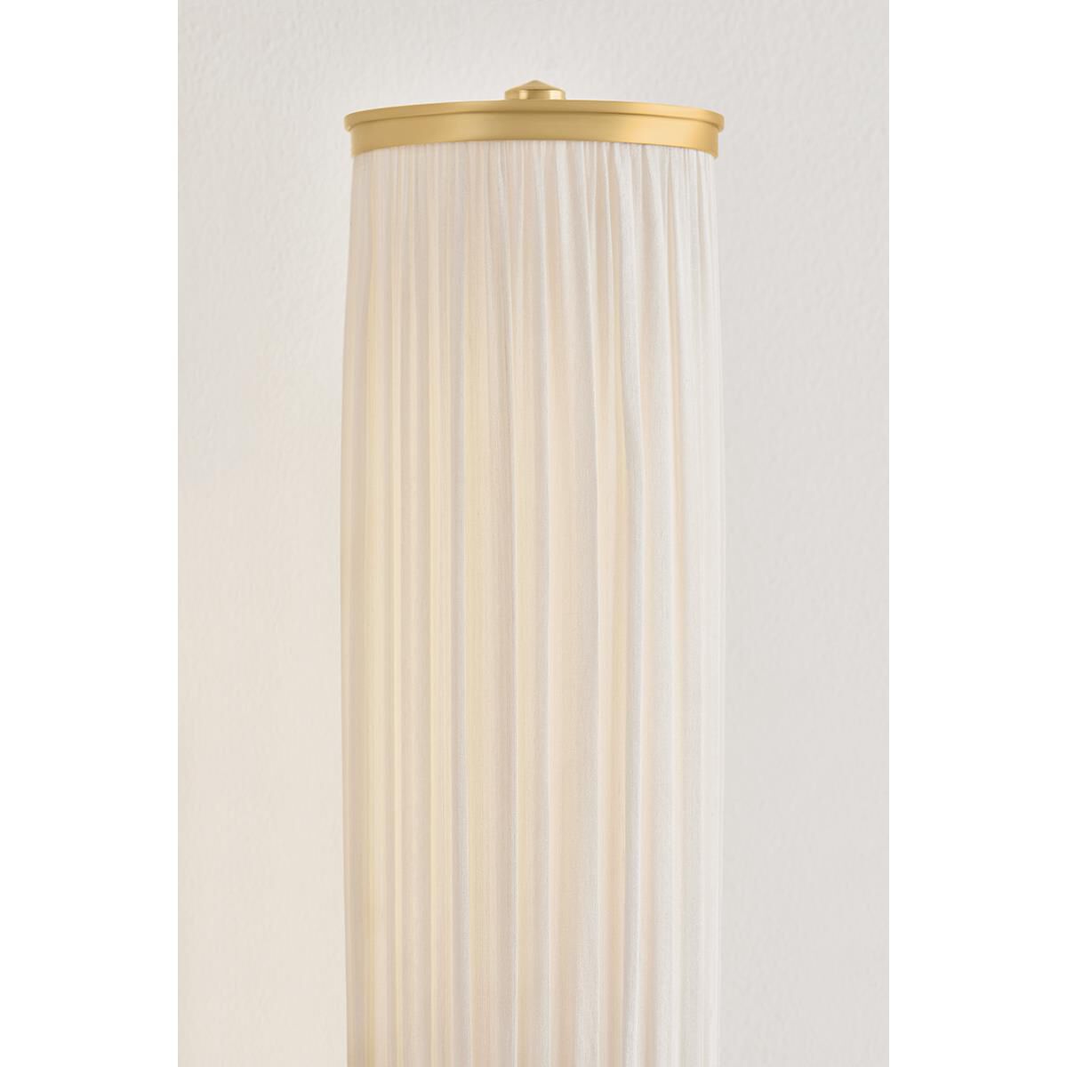 Shown in Aged Brass finish and Ivory Silk shade
