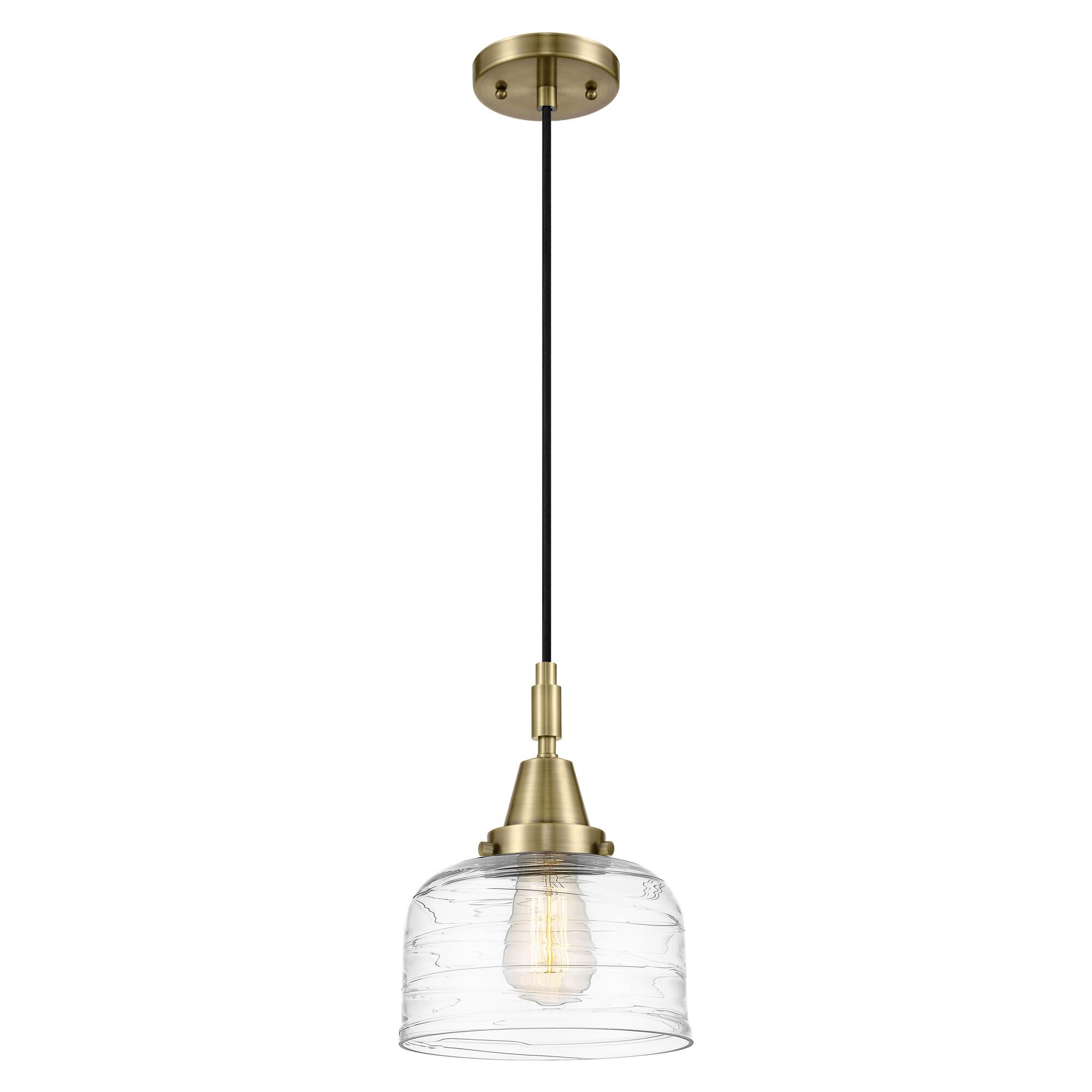 Shown in Antique Brass finish and Clear Deco Swirl glass
