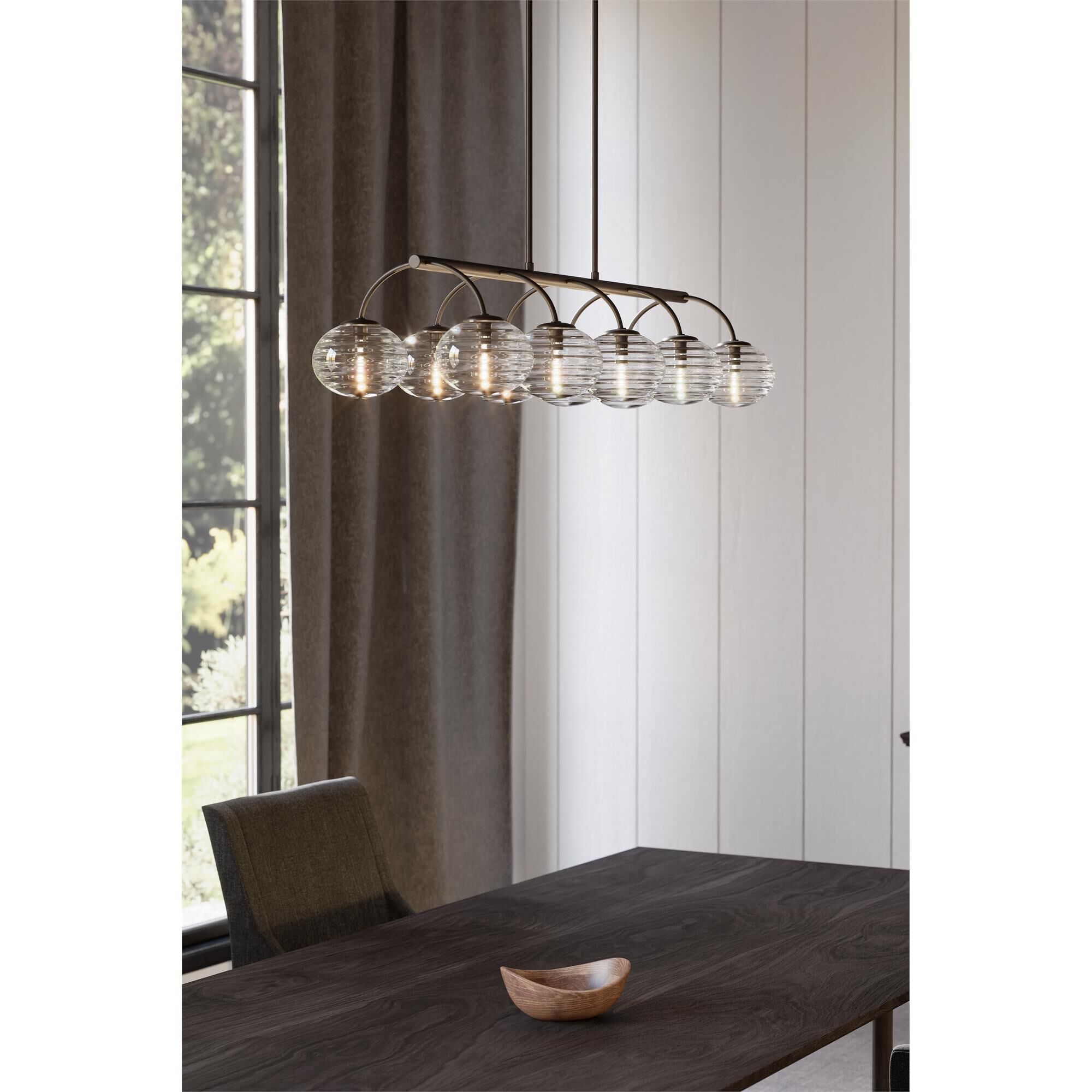 Shown in Dark Bronze finish and Clear Ribbed glass