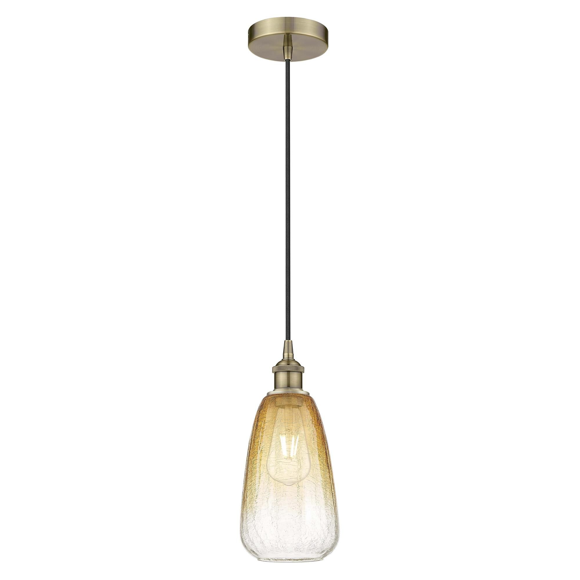 Shown in Antique Brass finish and Amber glass