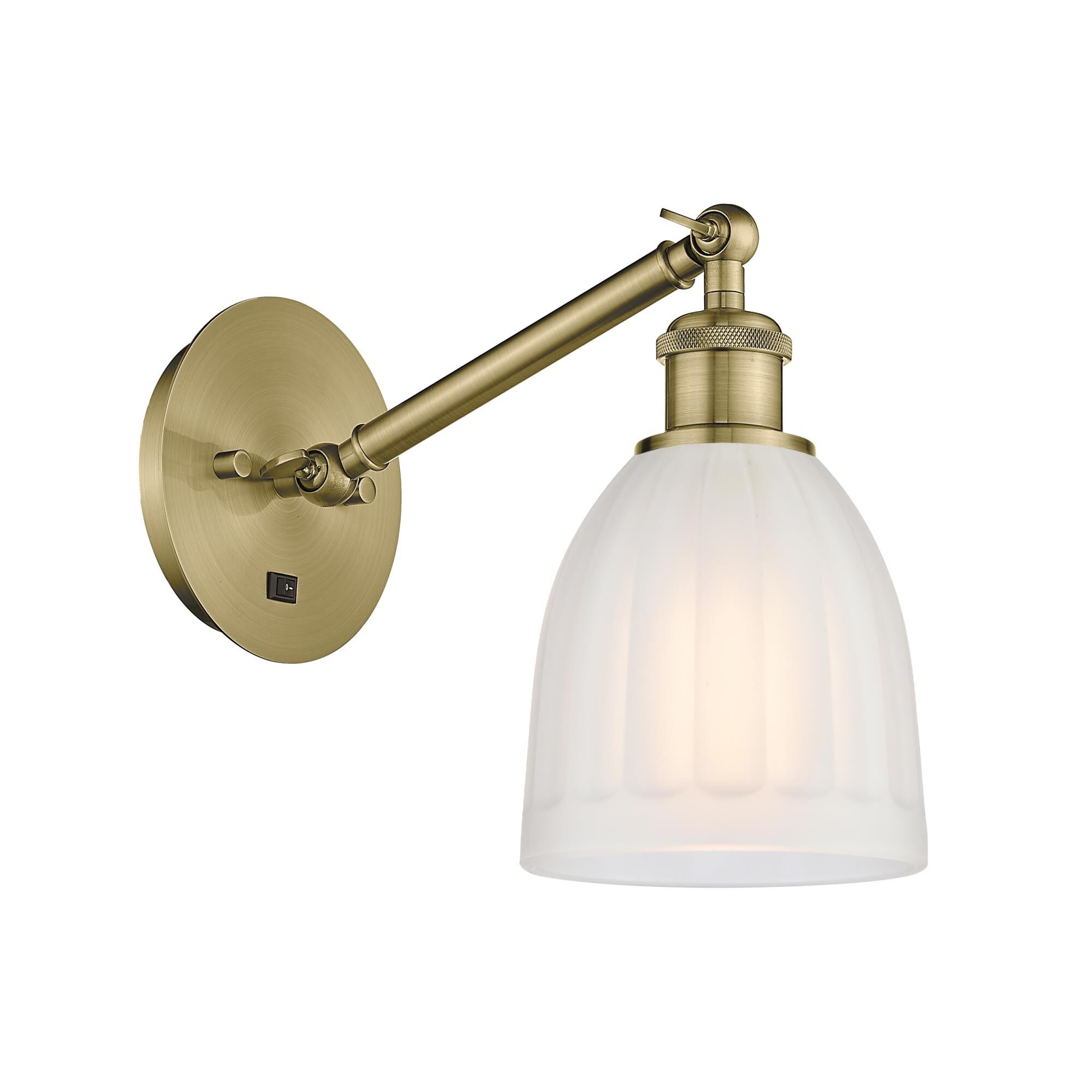 Shown in Antique Brass finish and White Brookfield glass
