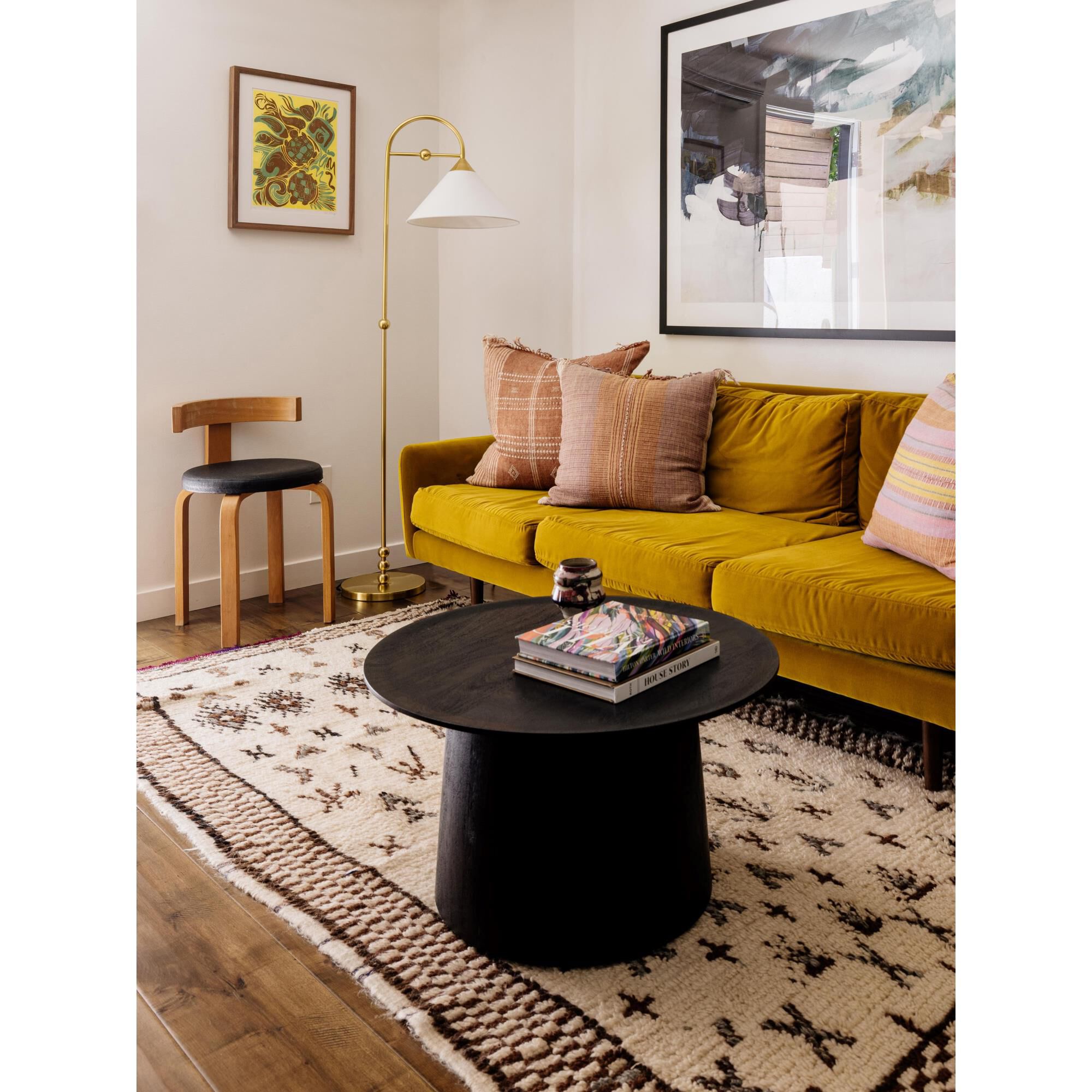 Shown in Aged Brass finish and White Linen shade