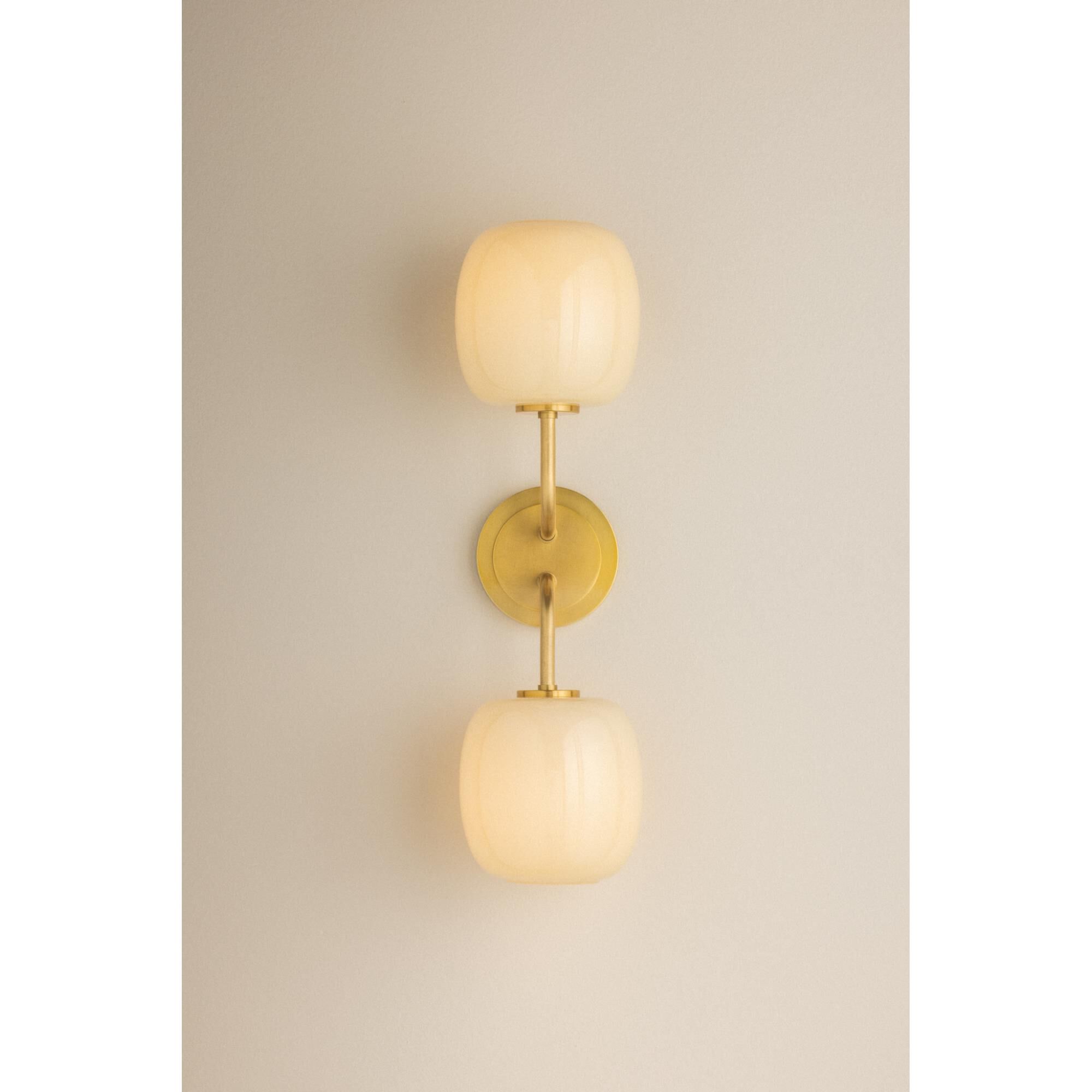 Shown in Aged Brass finish and Cream Opal glass