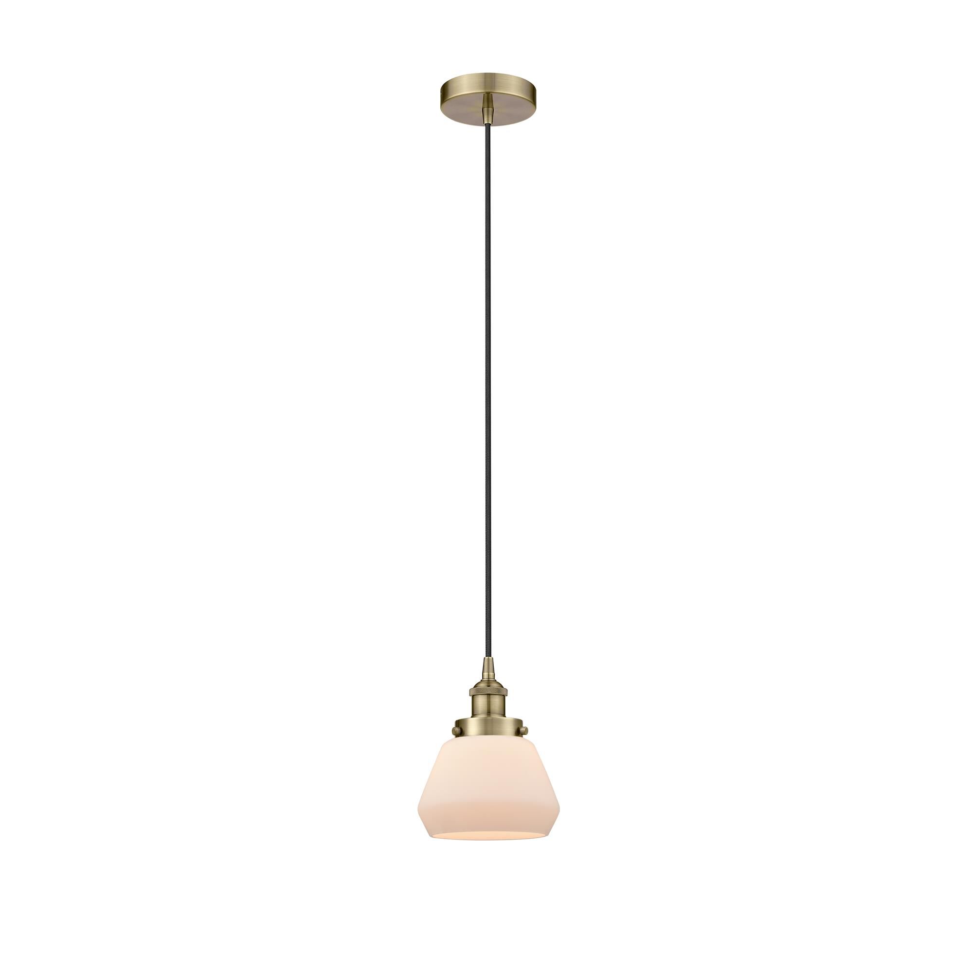 Shown in Antique Brass finish and Matte White glass