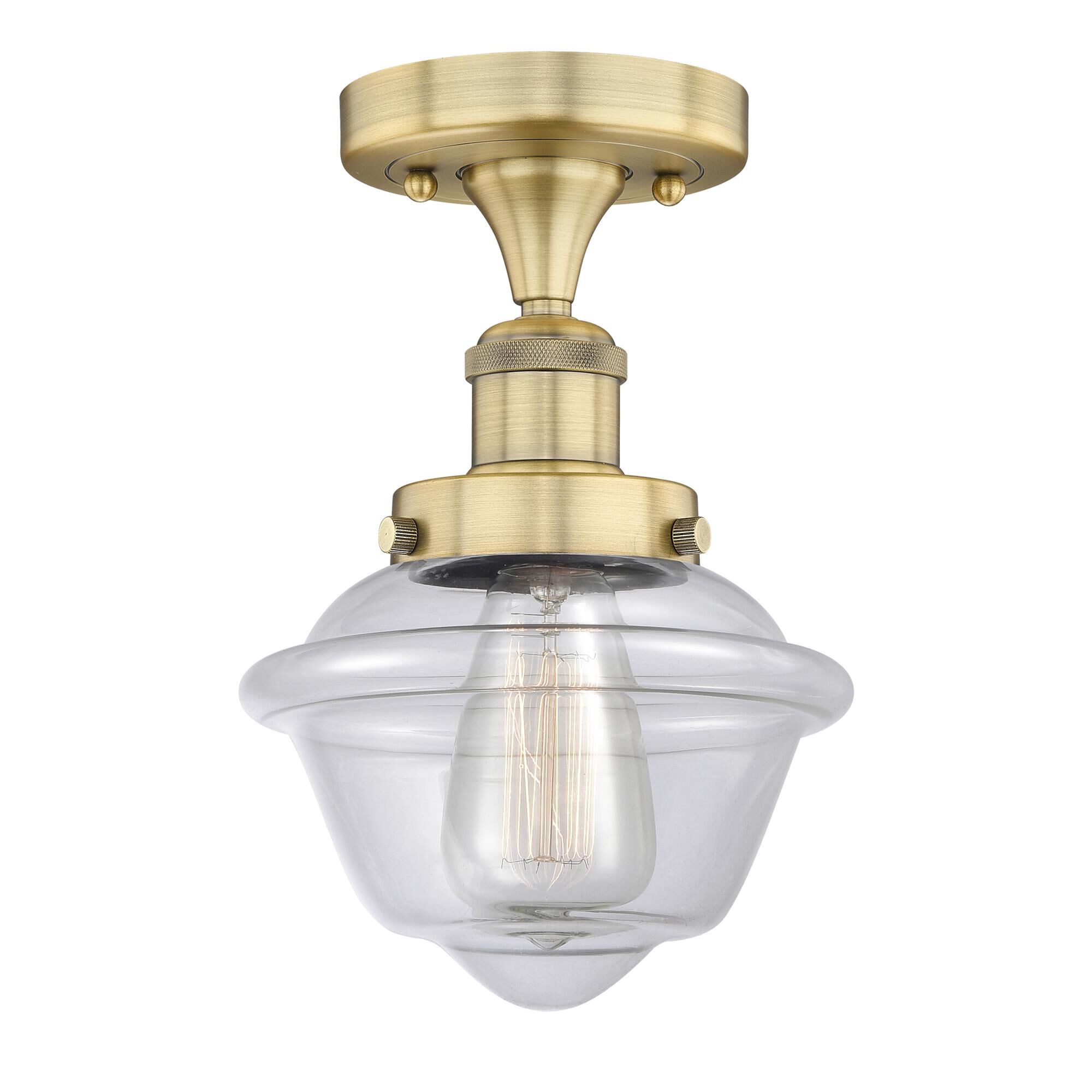 Shown in Brushed Brass finish and Clear glass