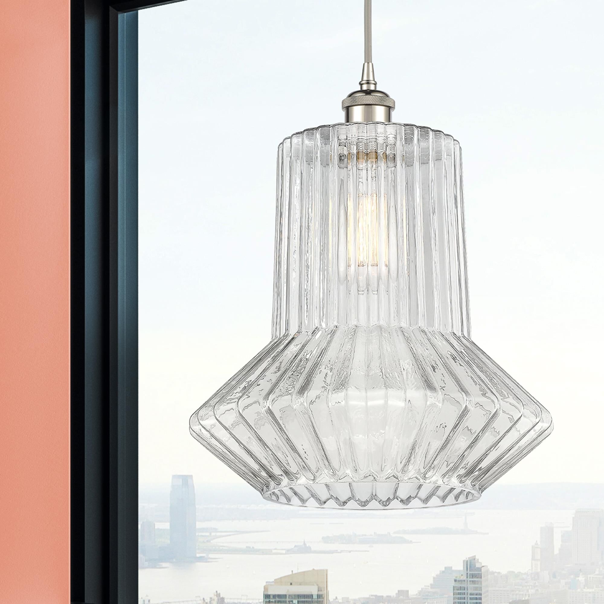 Shown in Polished Nickel finish and Clear Spiral Fluted Springwater glass and Polished Chrome accent