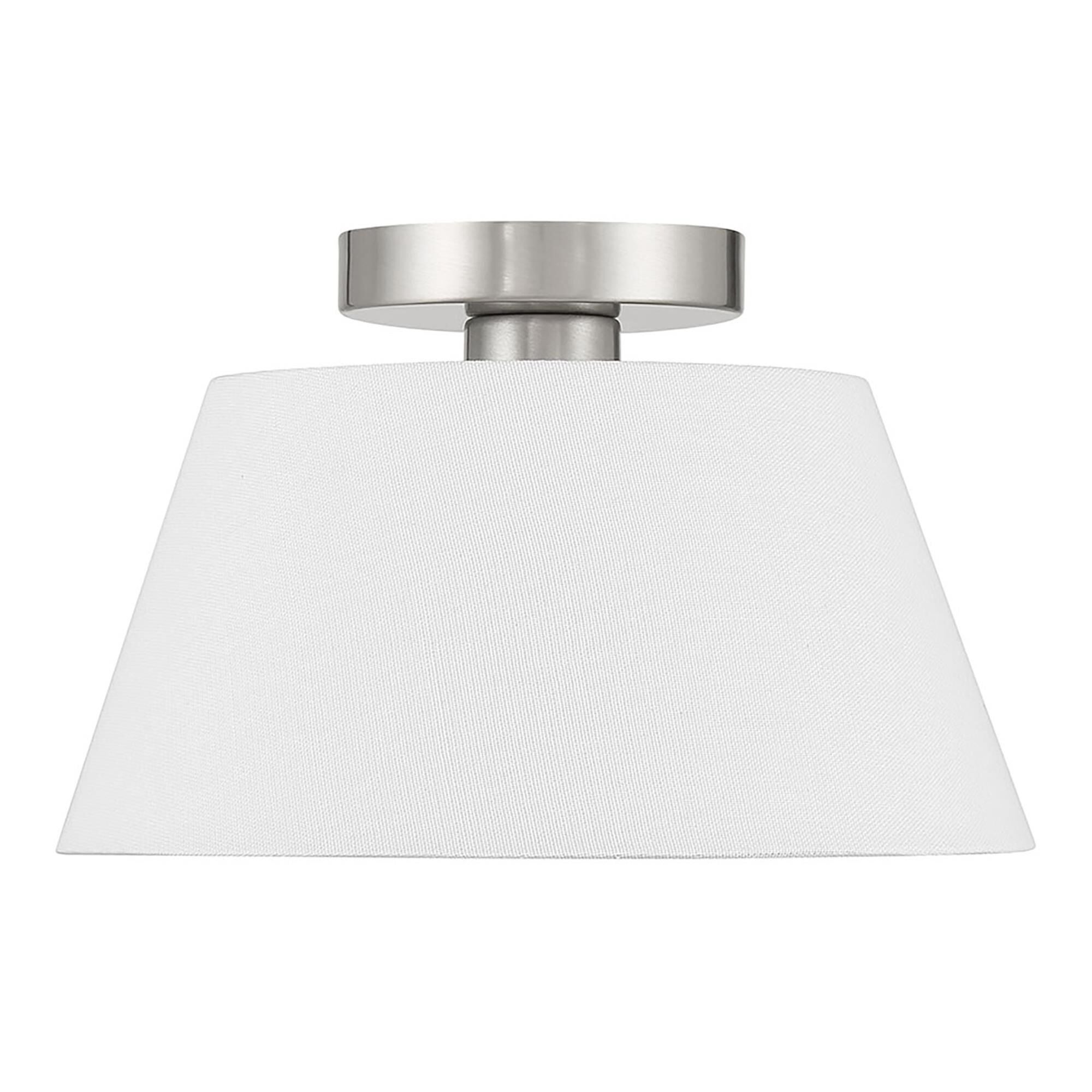 Shown in Brushed Nickel finish and White Linen Fabric shade