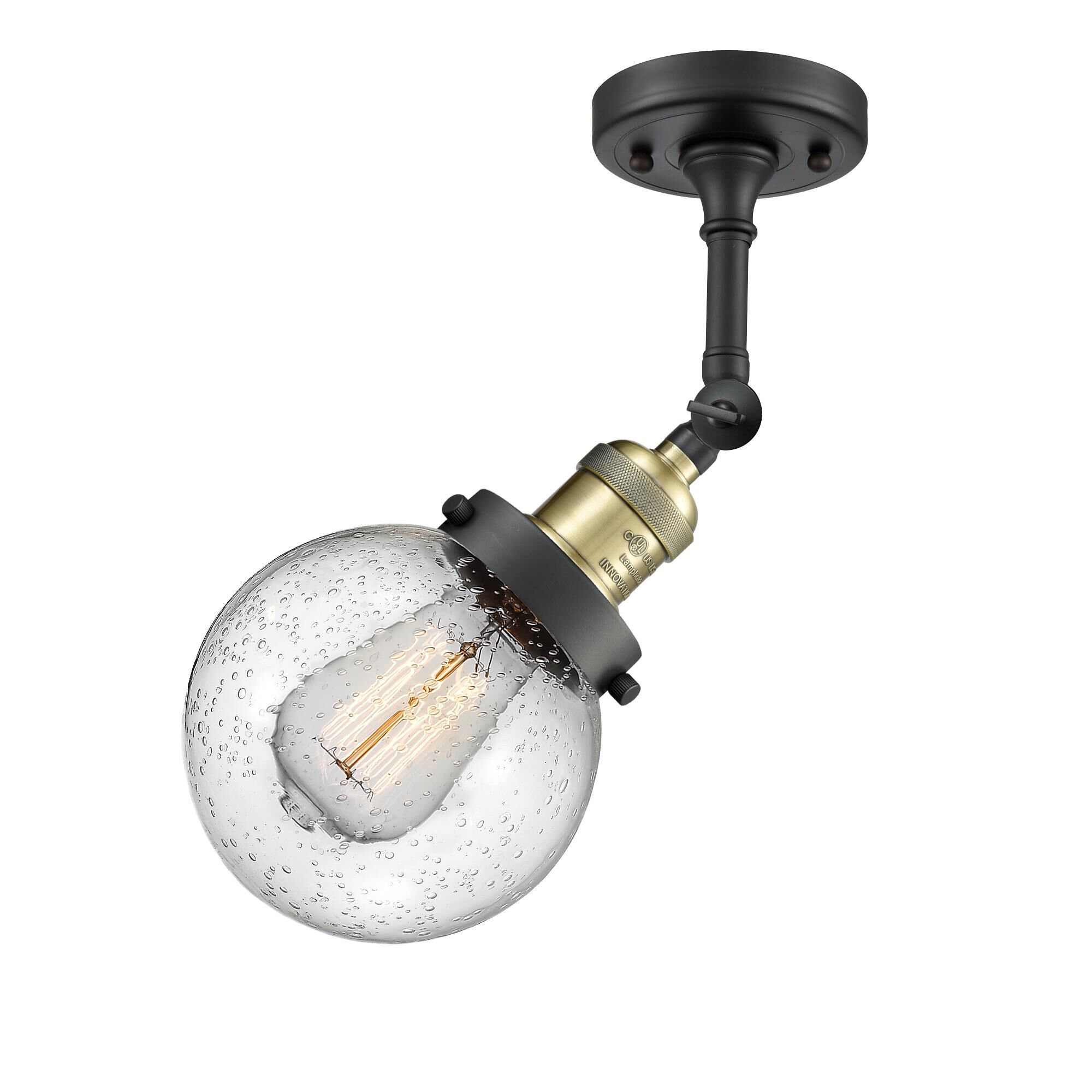 Shown in Black Antique Brass finish and Seedy glass and No Accent accent