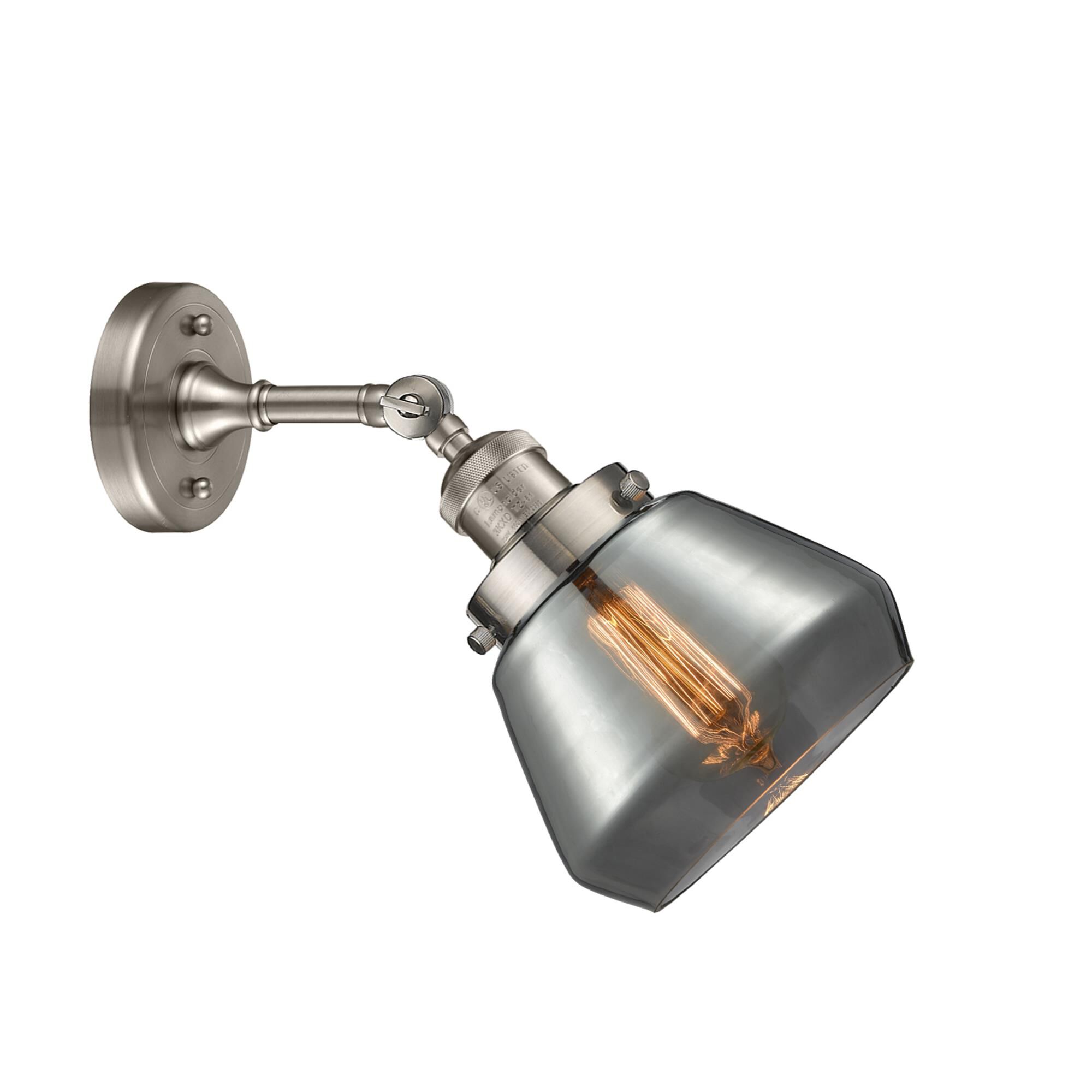 Shown in Brushed Satin Nickel finish and Plated Smoked glass and None accent
