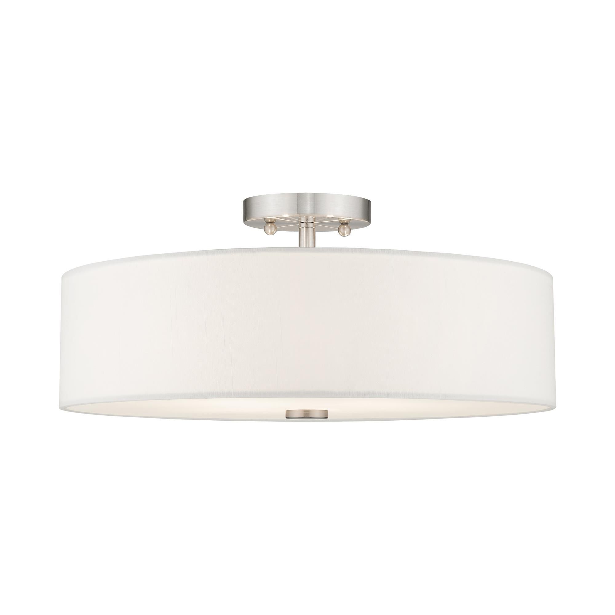 Shown in Brushed Nickel finish and Hand Crafted Off-White Fabric Hardback shade