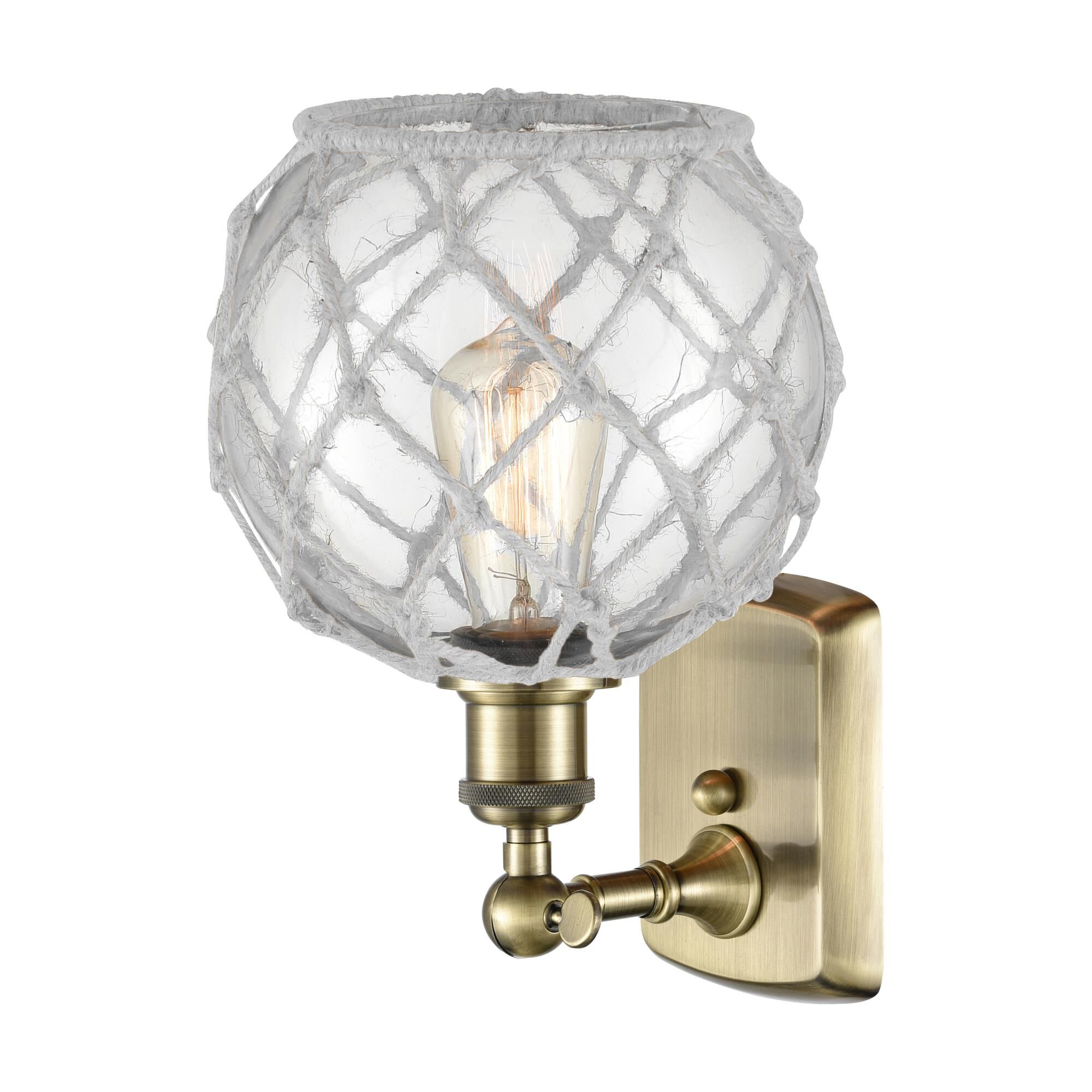 Shown in Antique Brass finish and Clear with White Rope glass