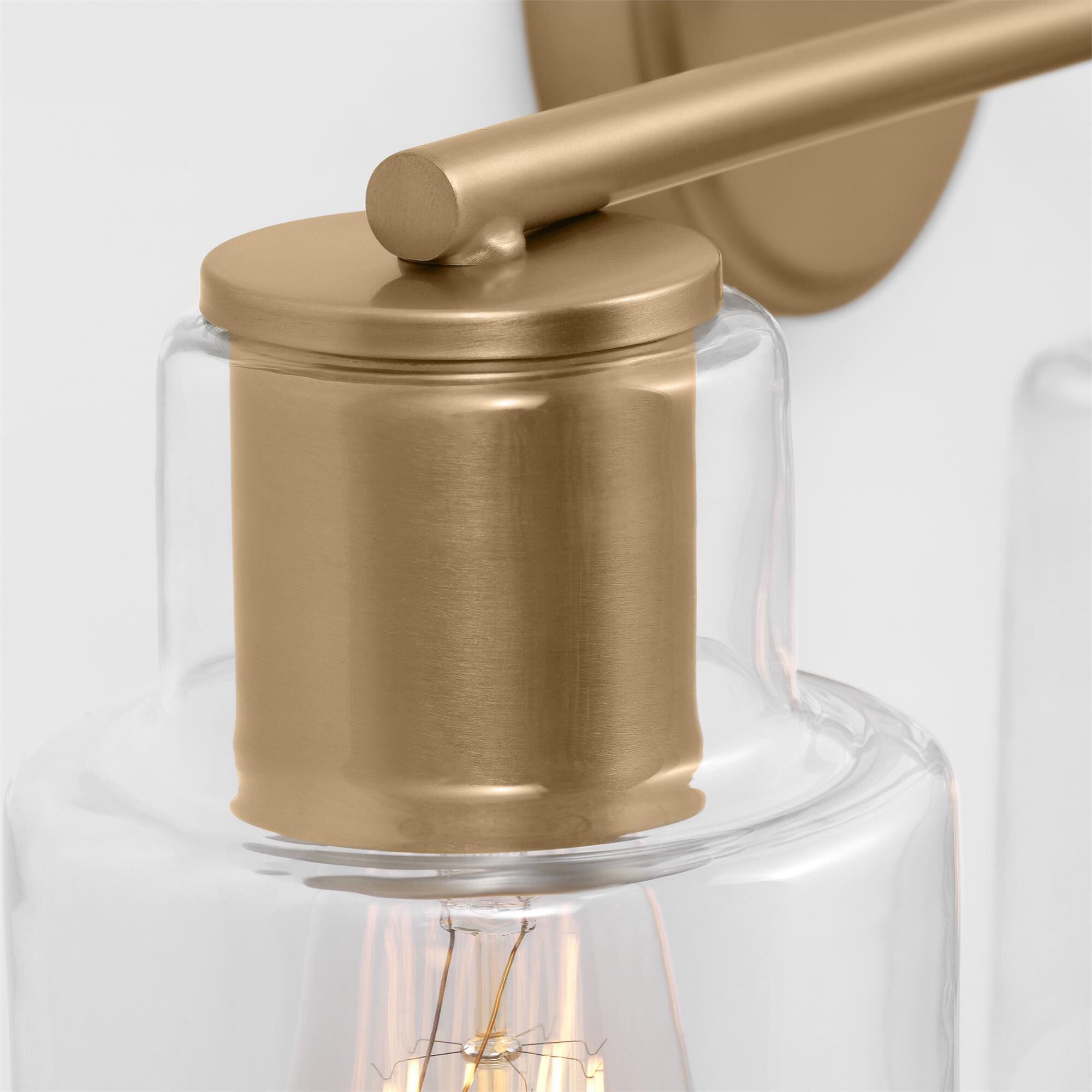 Shown in Satin Brass finish and Clear Glass s shade