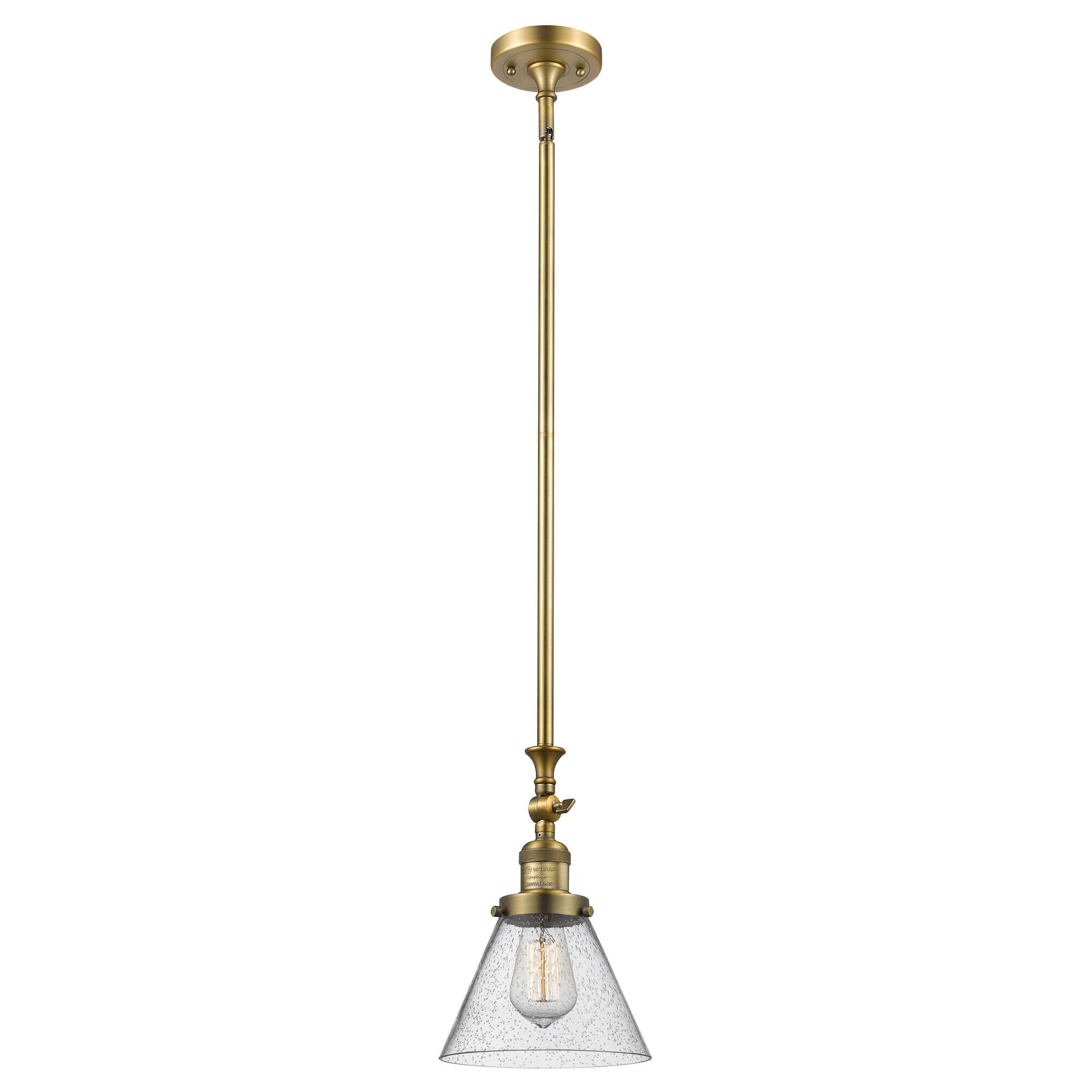 Shown in Brushed Brass finish and Seedy glass