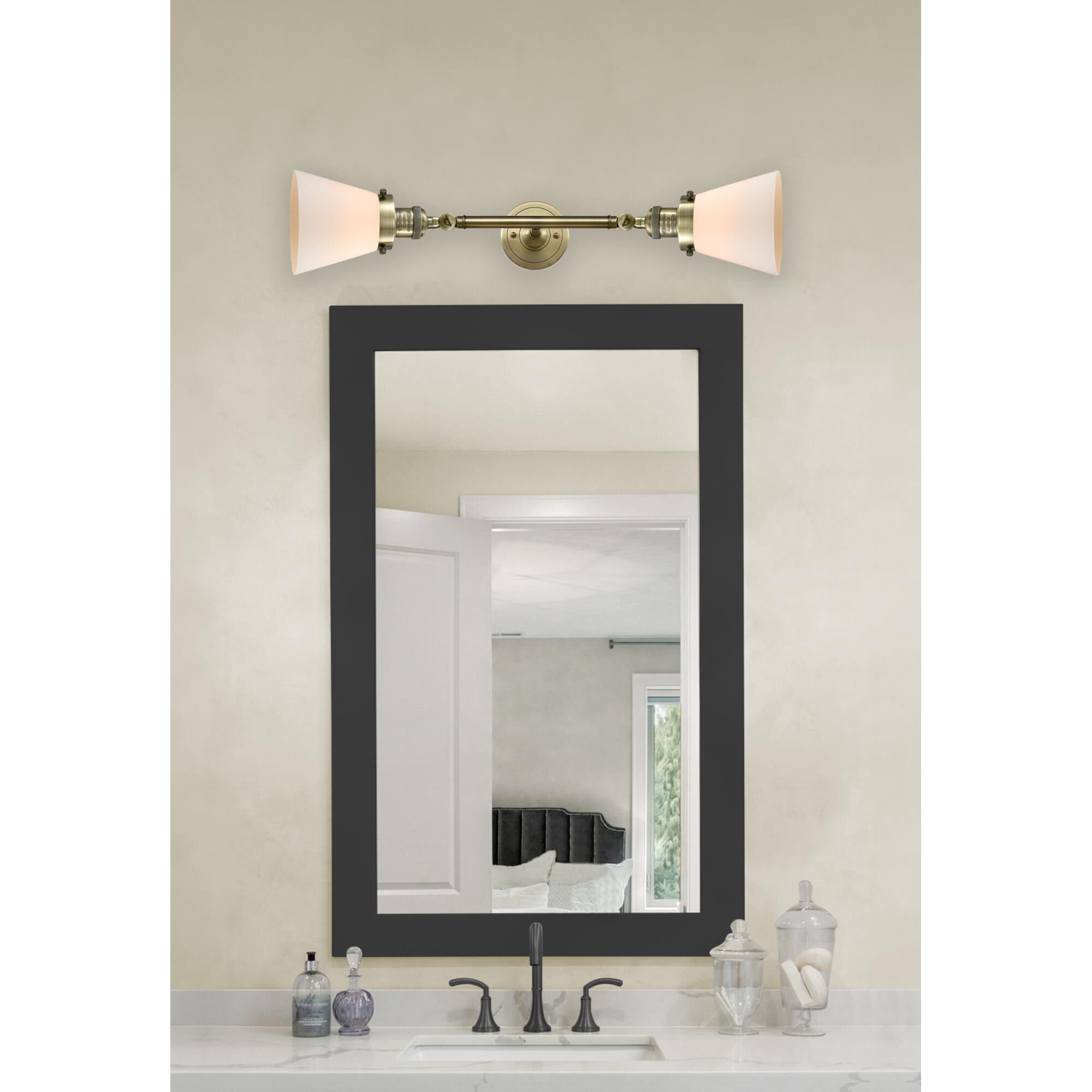 Shown in Antique Brass finish and Matte White Cased glass