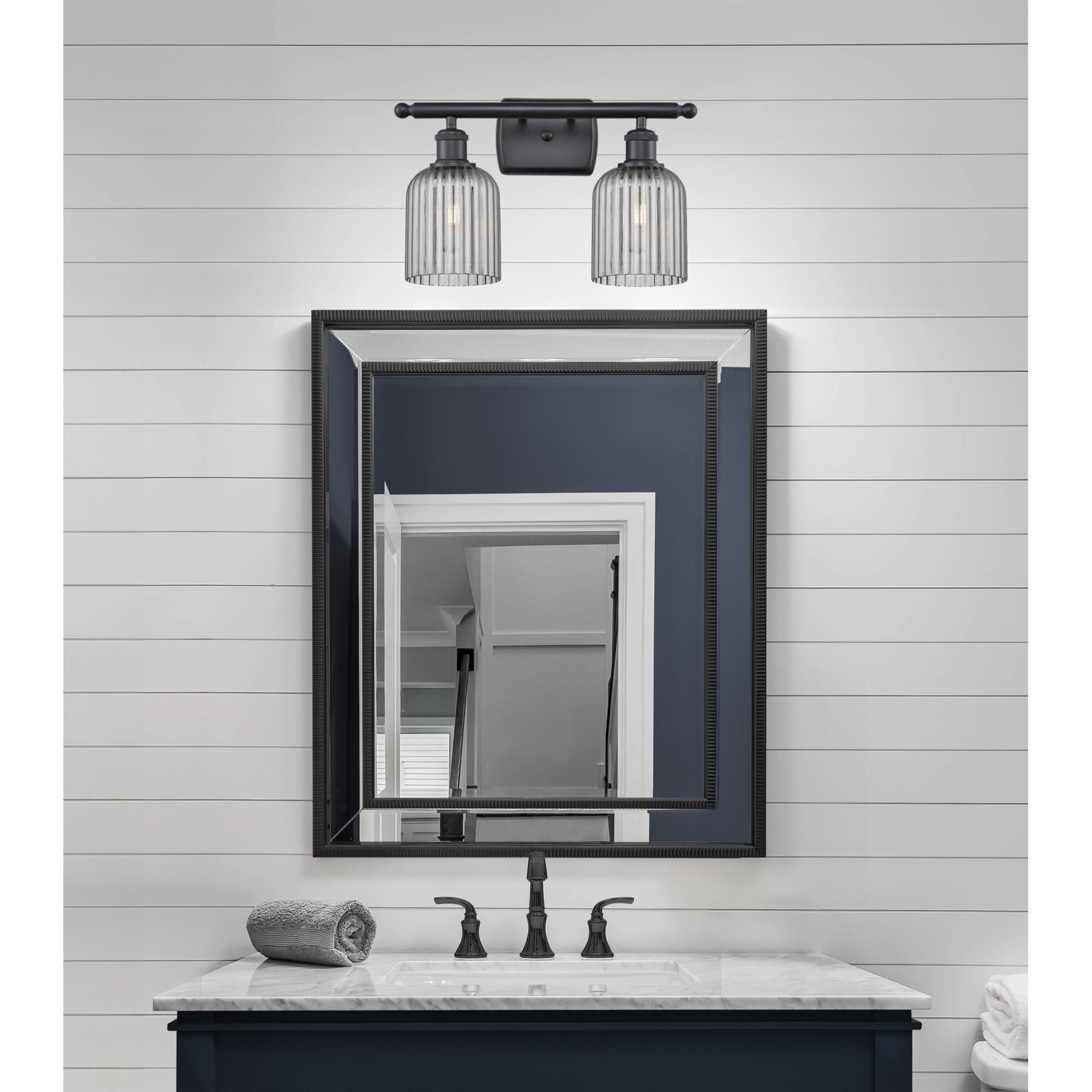 Shown in Matte Black finish and Light Smoke glass