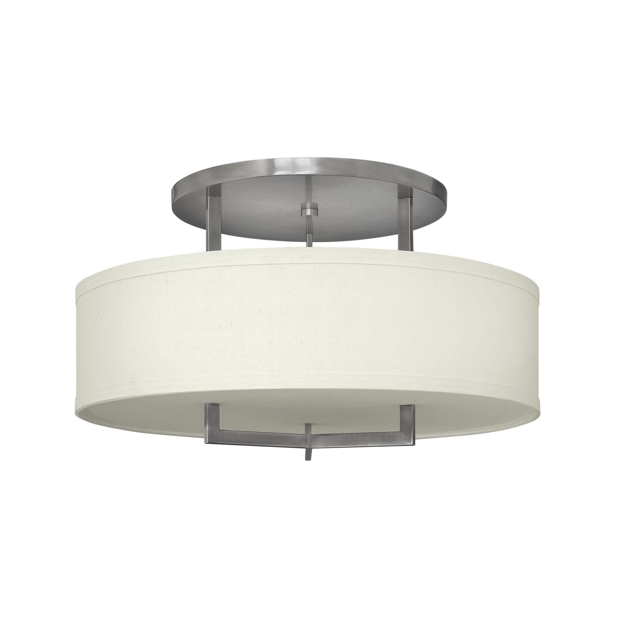 Shown in Antique Nickel finish and Off-White Linen Hardback shade