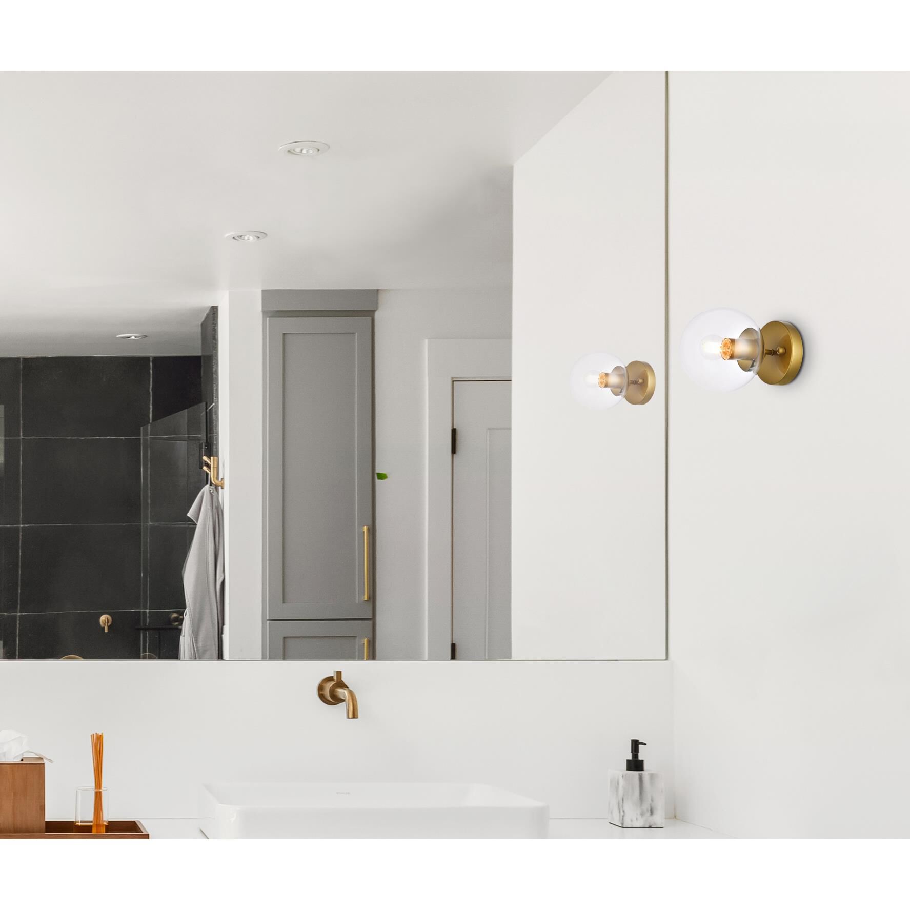 Shown in Brass finish and Clear glass