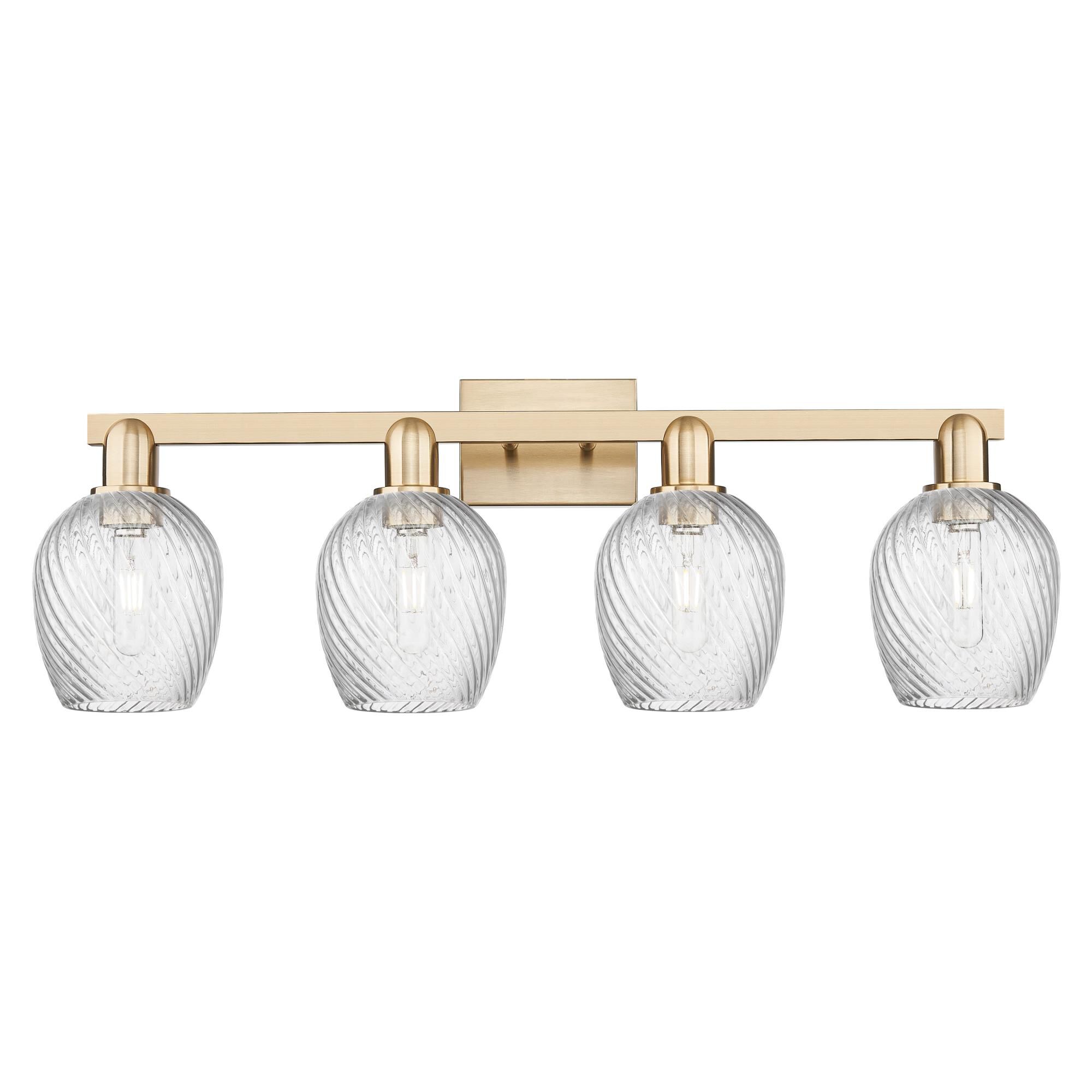 Shown in Champagne Bronze finish and Clear Spiral Fluted glass