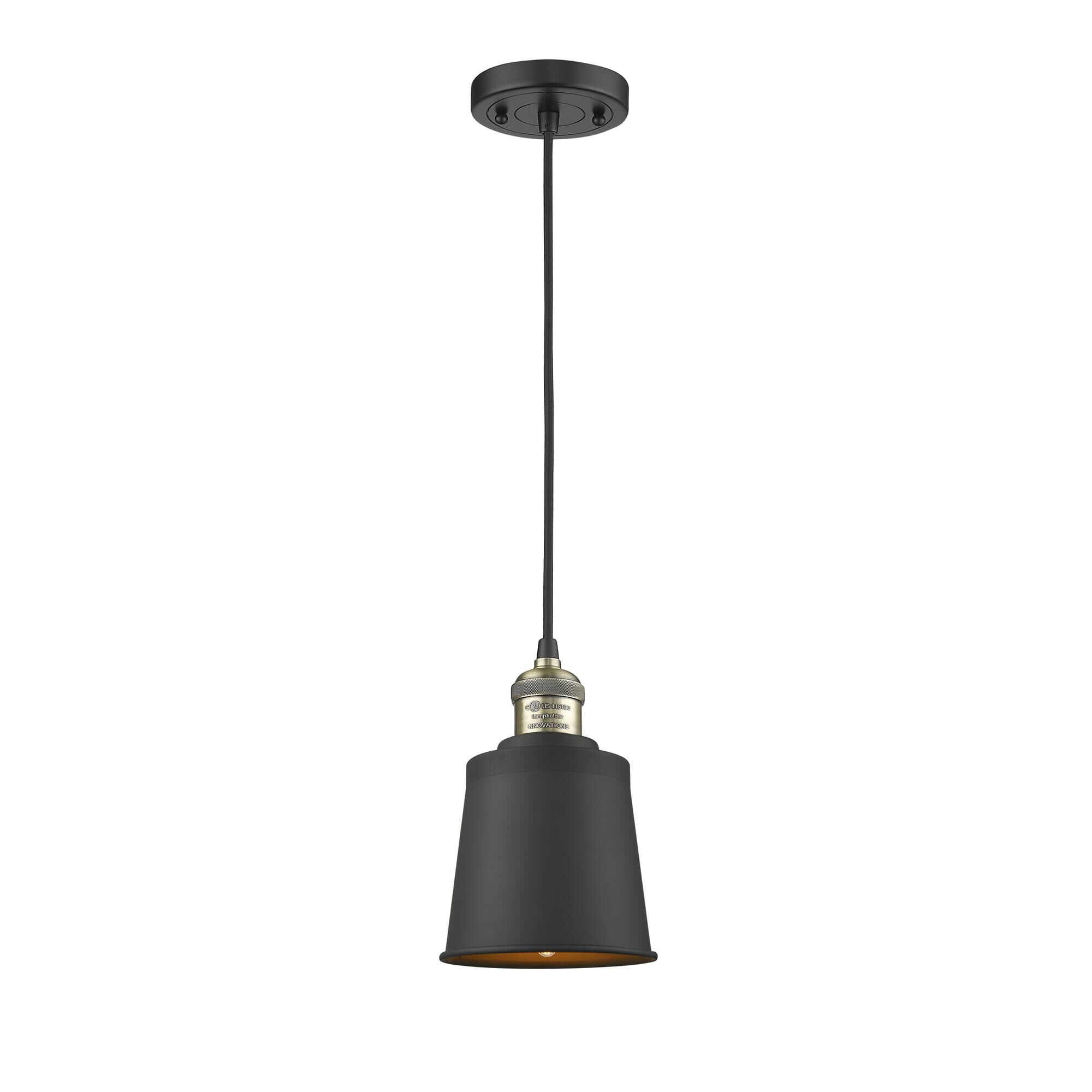 Shown in Black Antique Brass finish and Cone glass and Metal shade