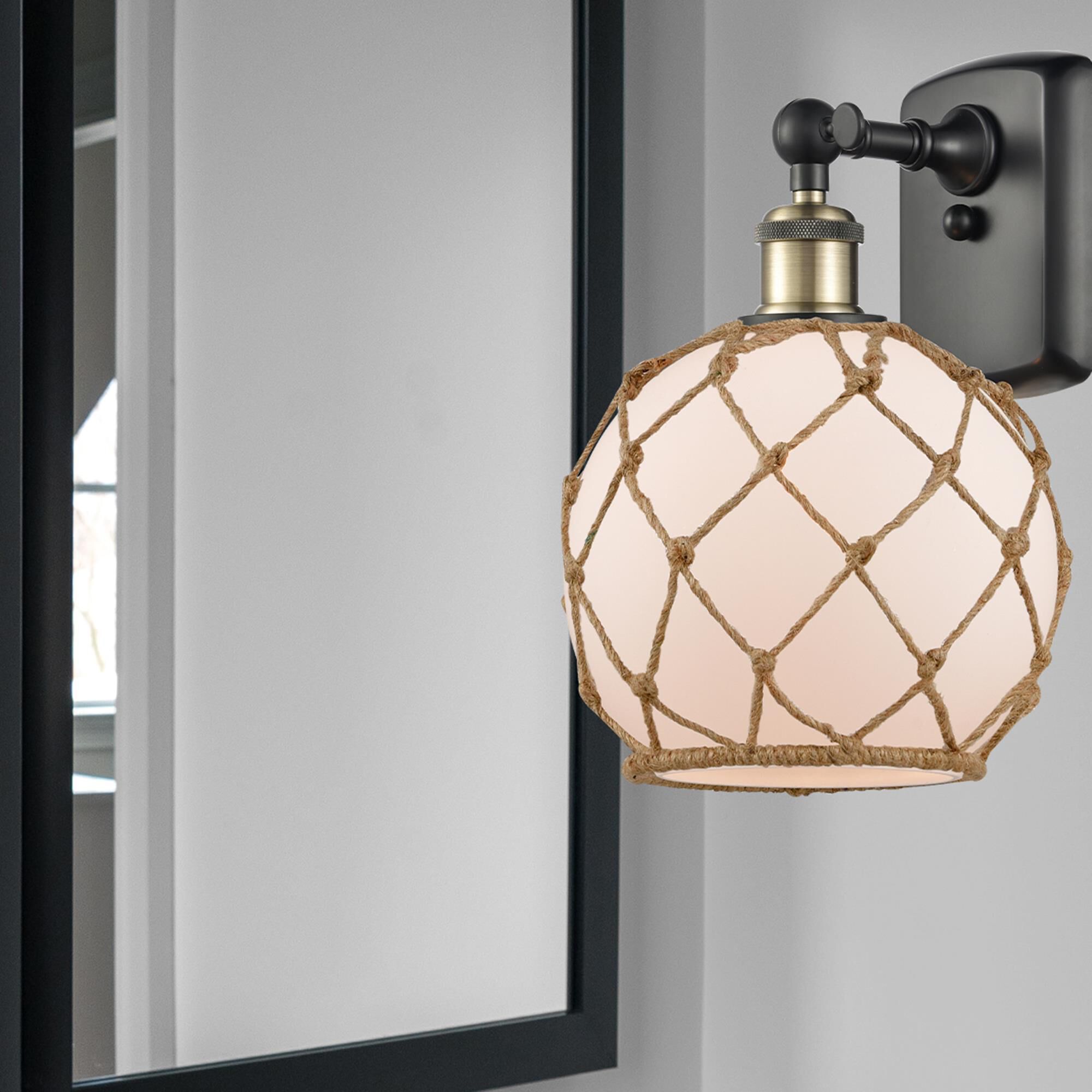 Shown in Black Antique Brass finish and Sphere glass and Glass And Rope shade