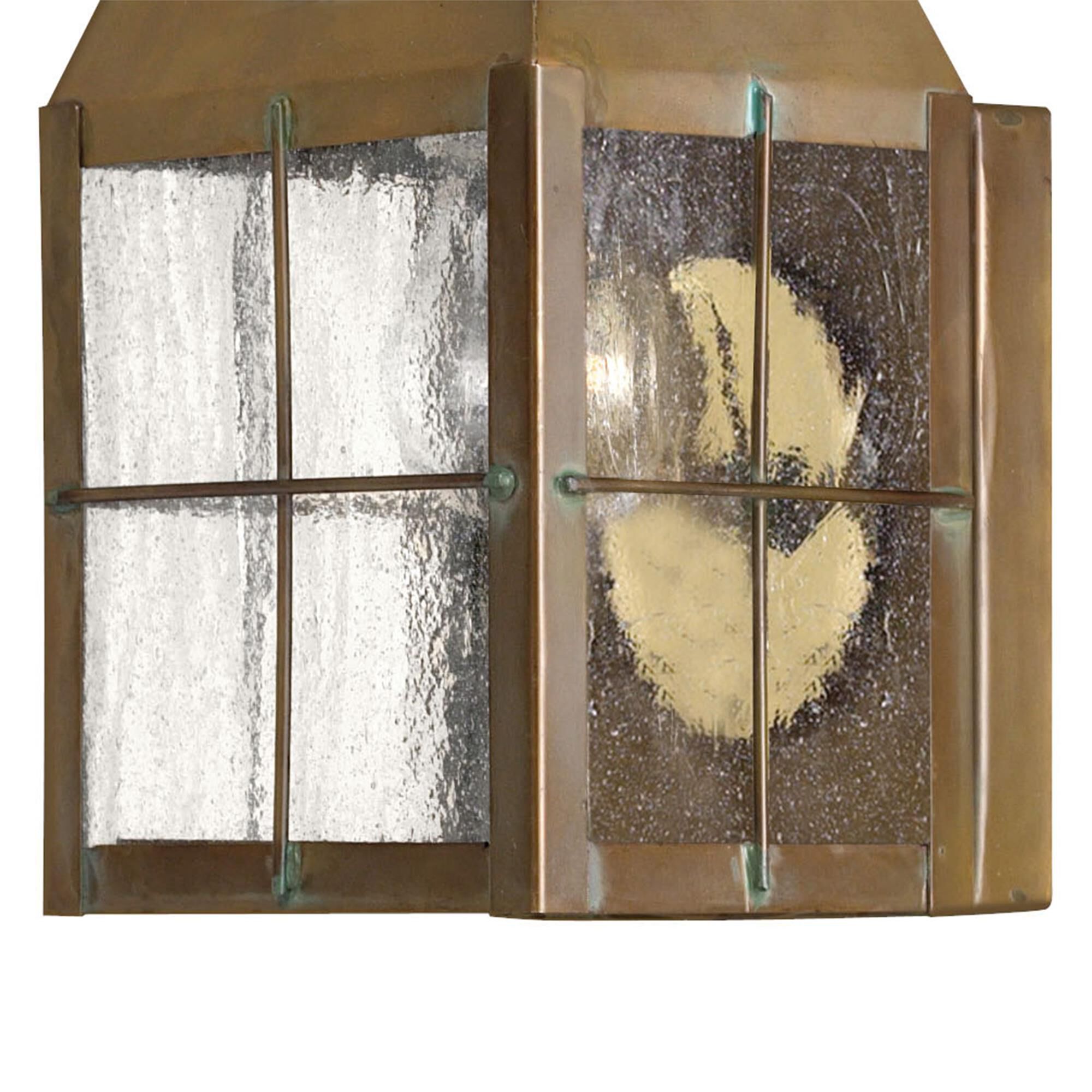 Shown in Aged Brass finish and Clear Seedy Panels glass