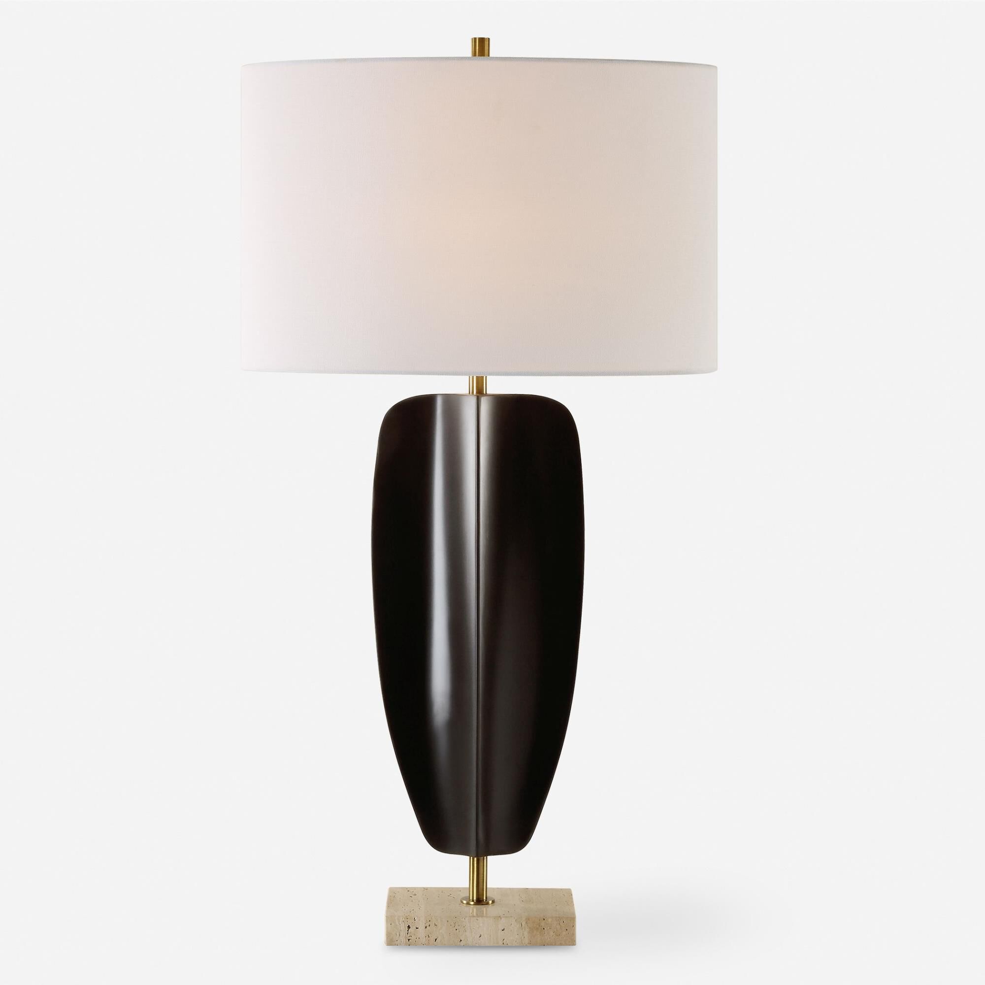 Shown in The Kure Table Lamp Is Crafted From Hand Forged Iron Finished In Matte Black, Replicating A Tribal S finish and Oval Hardback shade