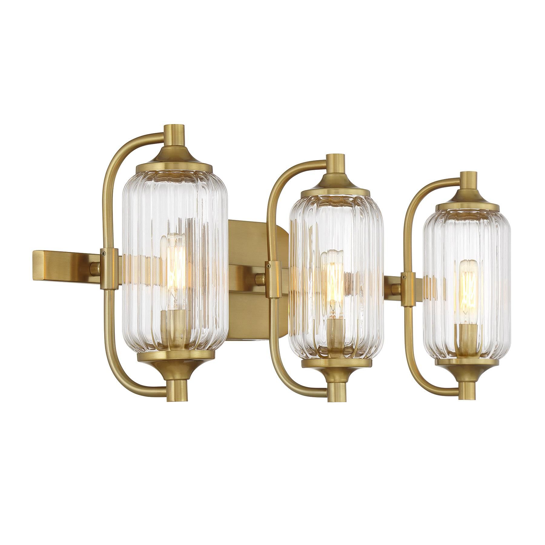 Shown in Warm Brass finish and Clear Ribbed glass