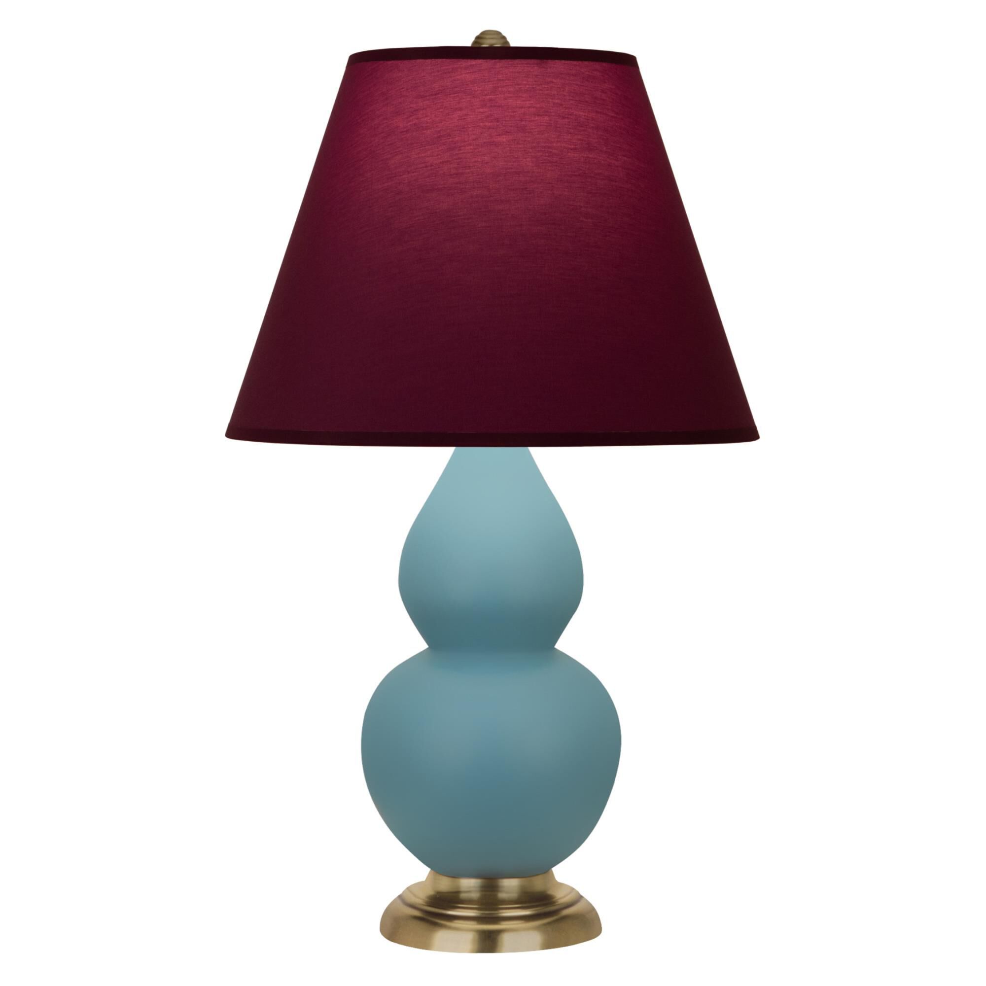 Shown in Matte Steel Blue finish and Plum and Lavender shade and Antique Brass accent