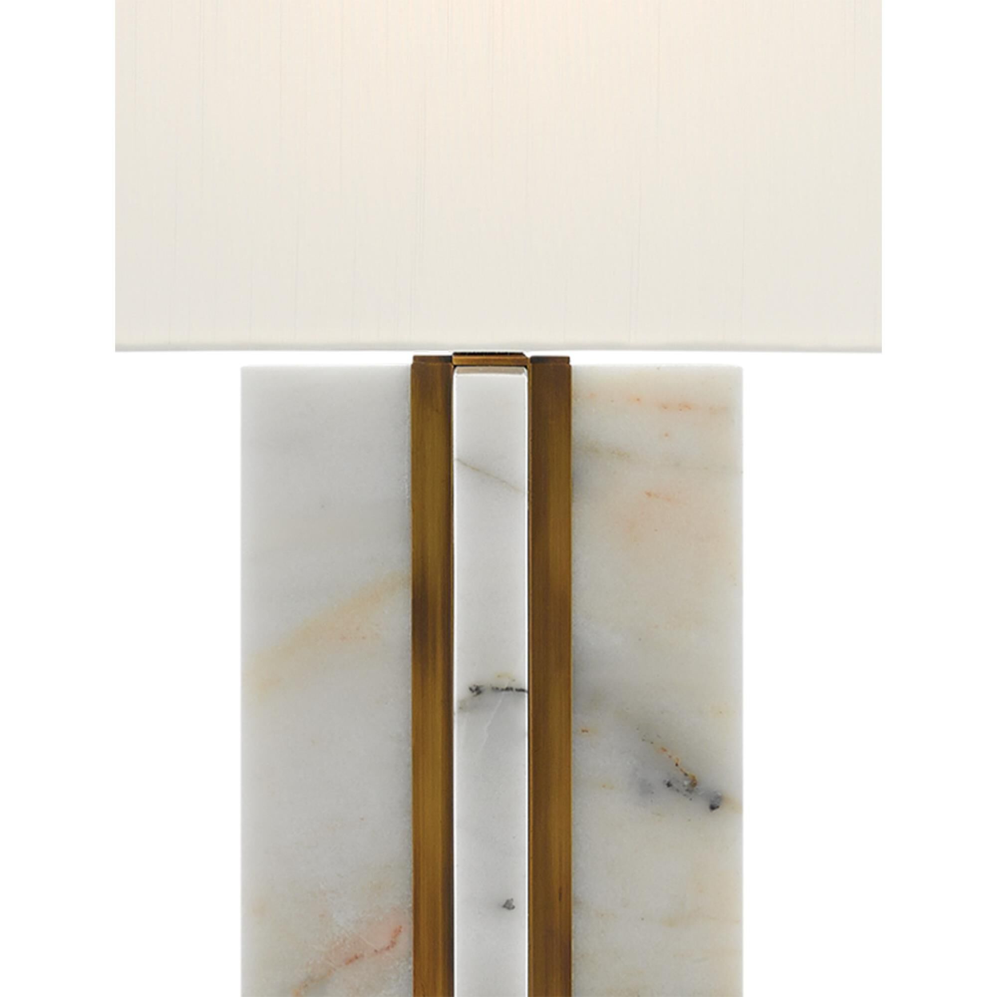 Shown in Marble/Antique Brass finish and Included shade