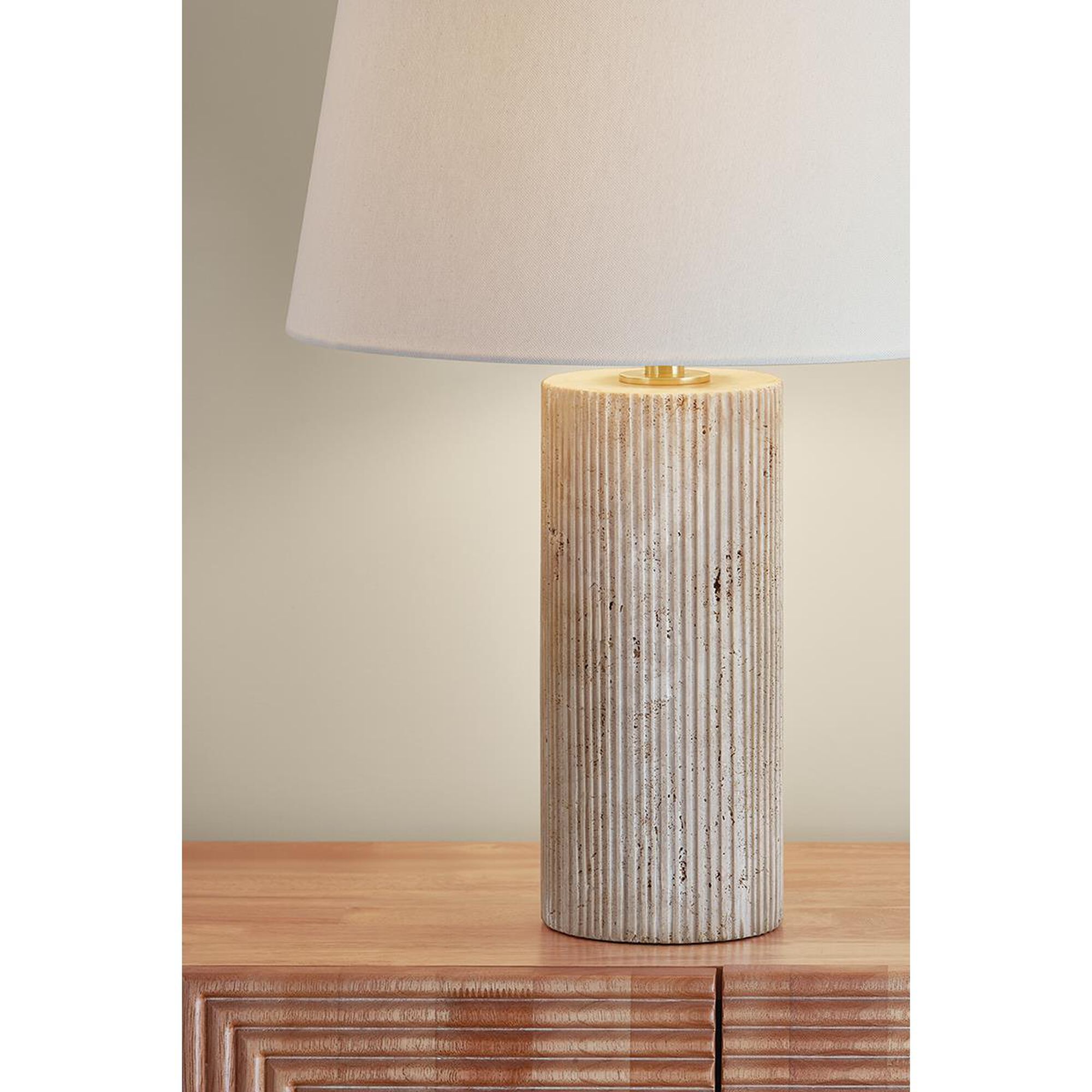 Shown in Aged Brass finish and Off White Linen shade