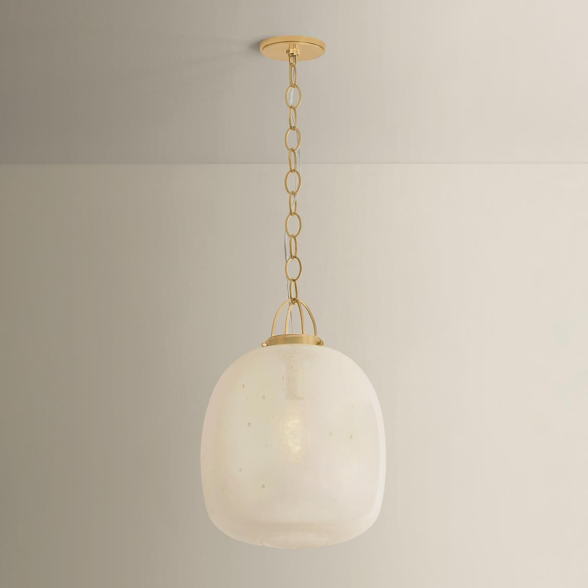 Shown in Aged Brass finish and Clear Cloud Seeded glass